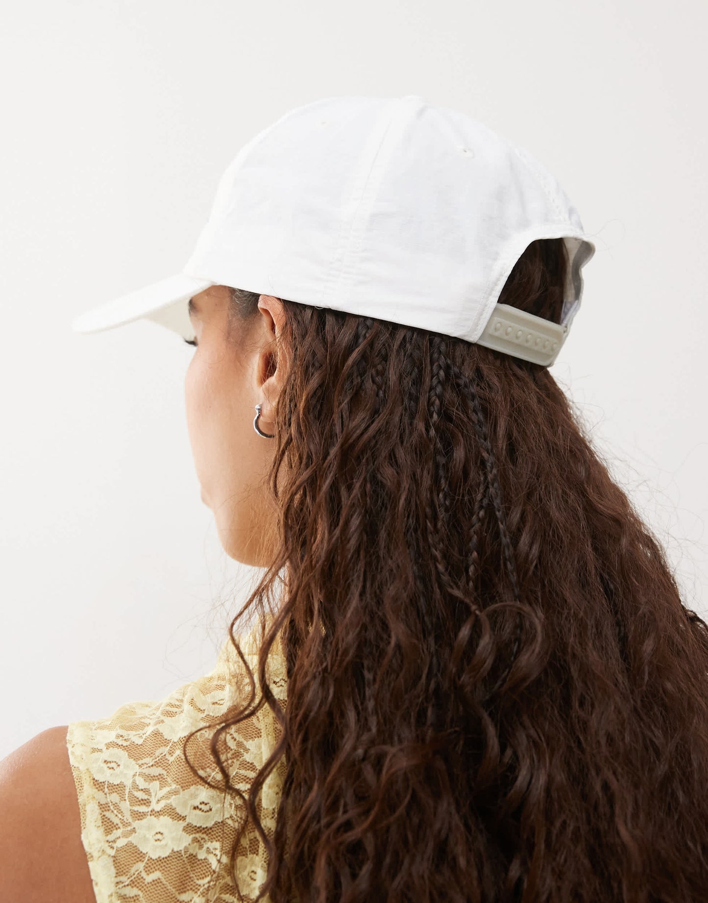 COLLUSION embroidered slogan cap in white