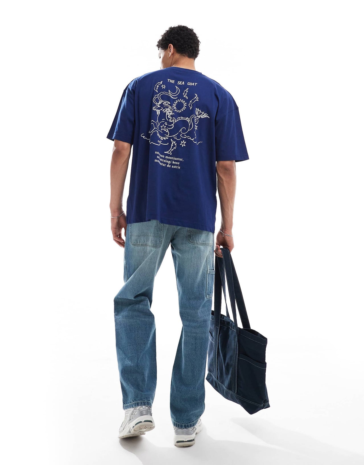 ASOS DESIGN oversized t-shirt with celestial graphic in navy