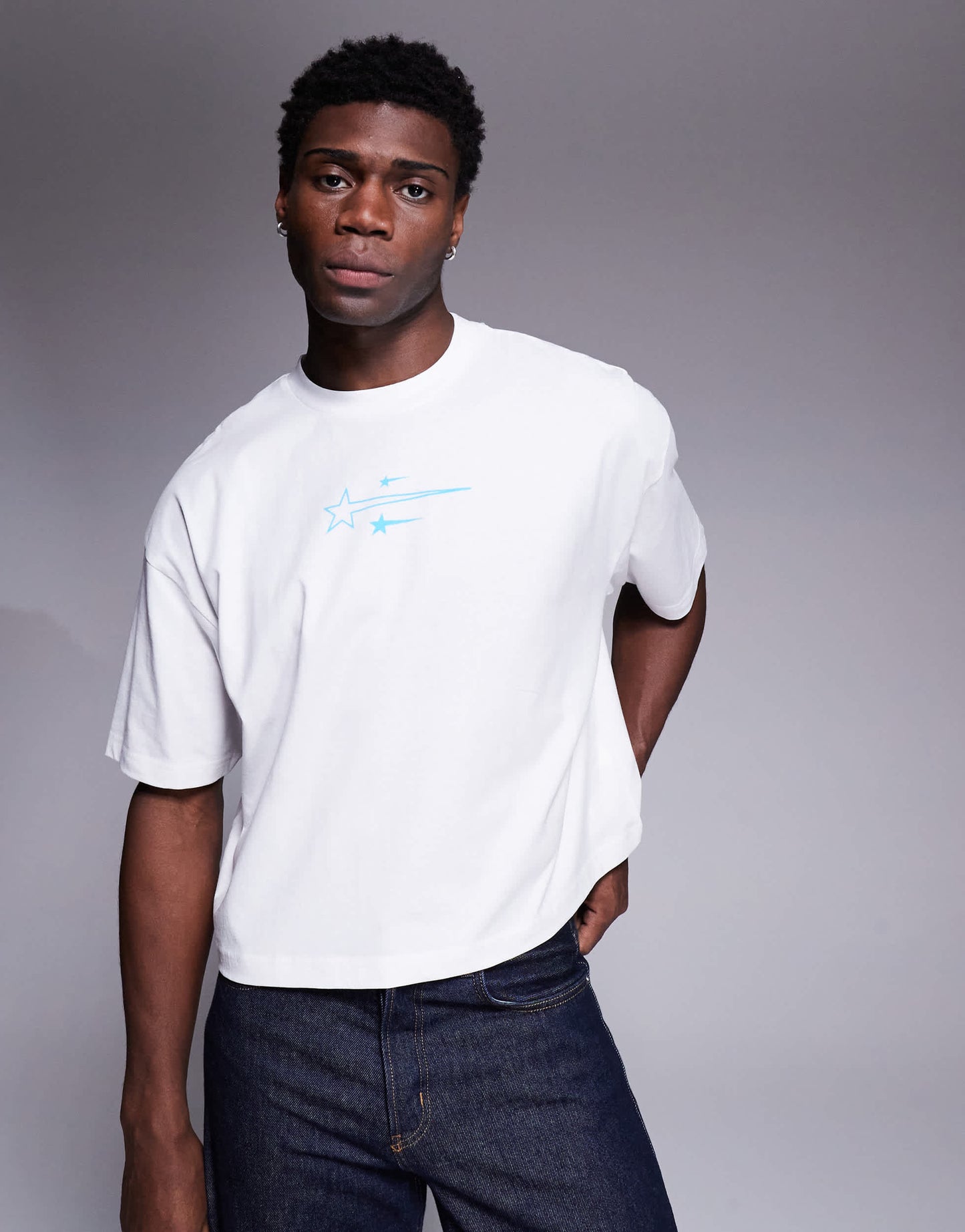 ASOS DESIGN cropped oversized t-shirt with sport graphic in white