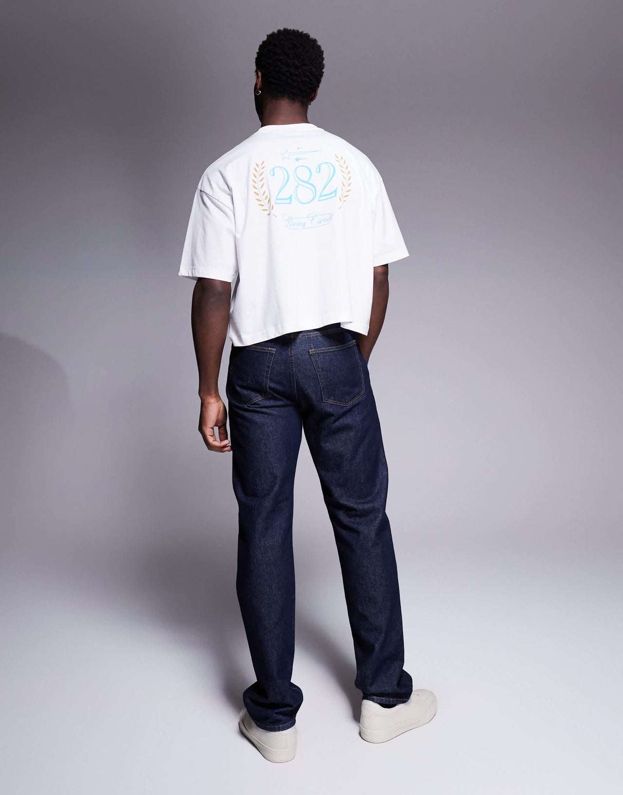 ASOS DESIGN cropped oversized t-shirt with sport graphic in white