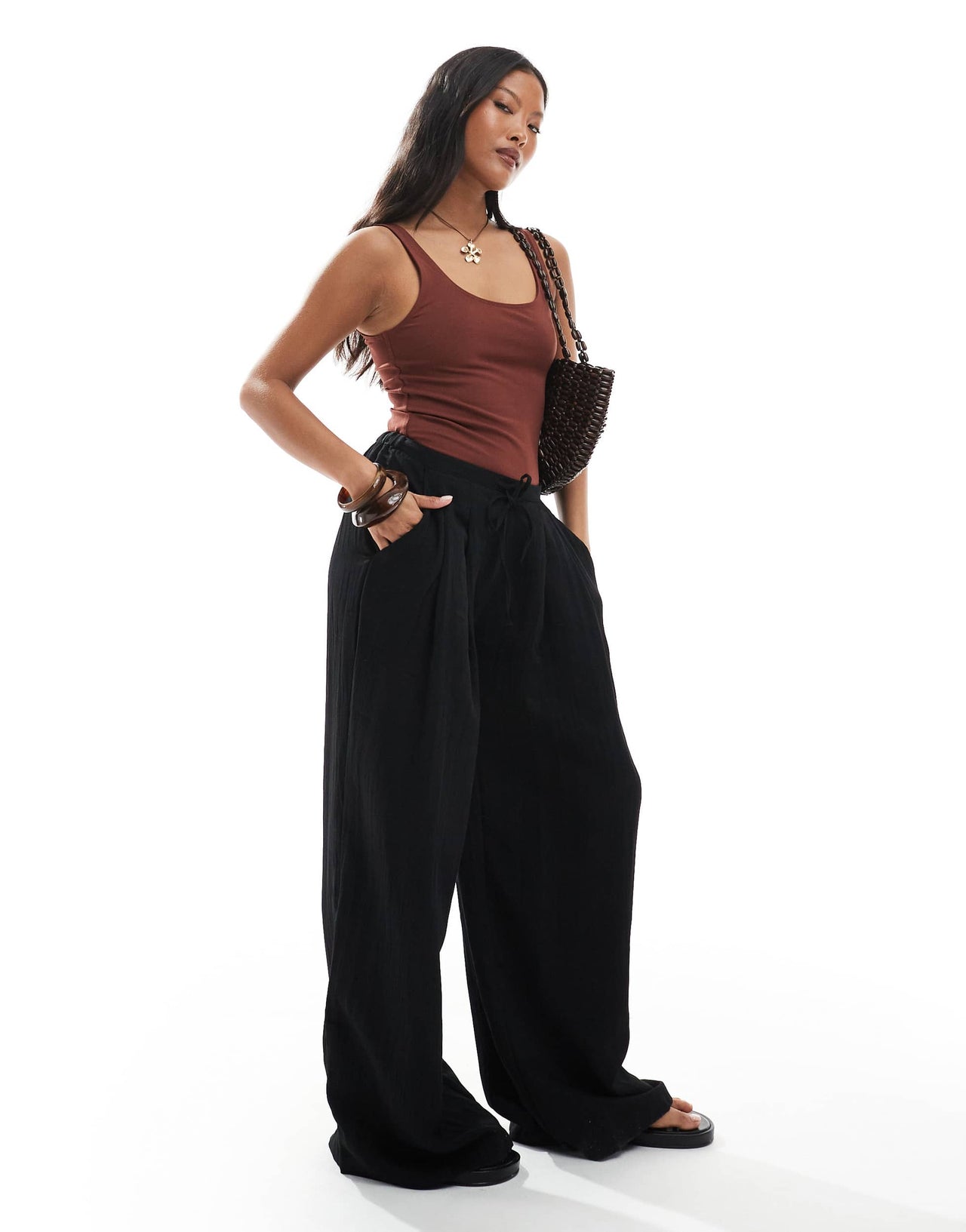 Stradivarius Petite wide leg crinkle tie waist trouser in black