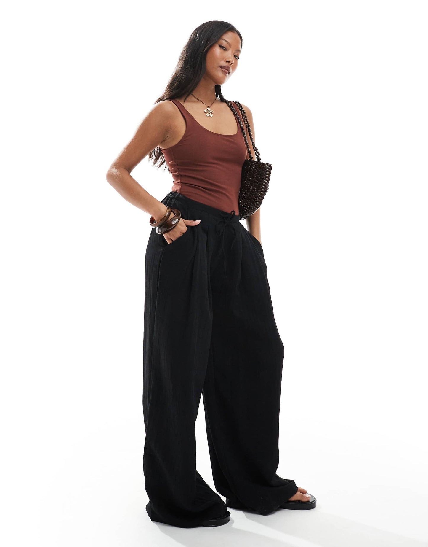 Stradivarius Petite wide leg crinkle tie waist trouser in black