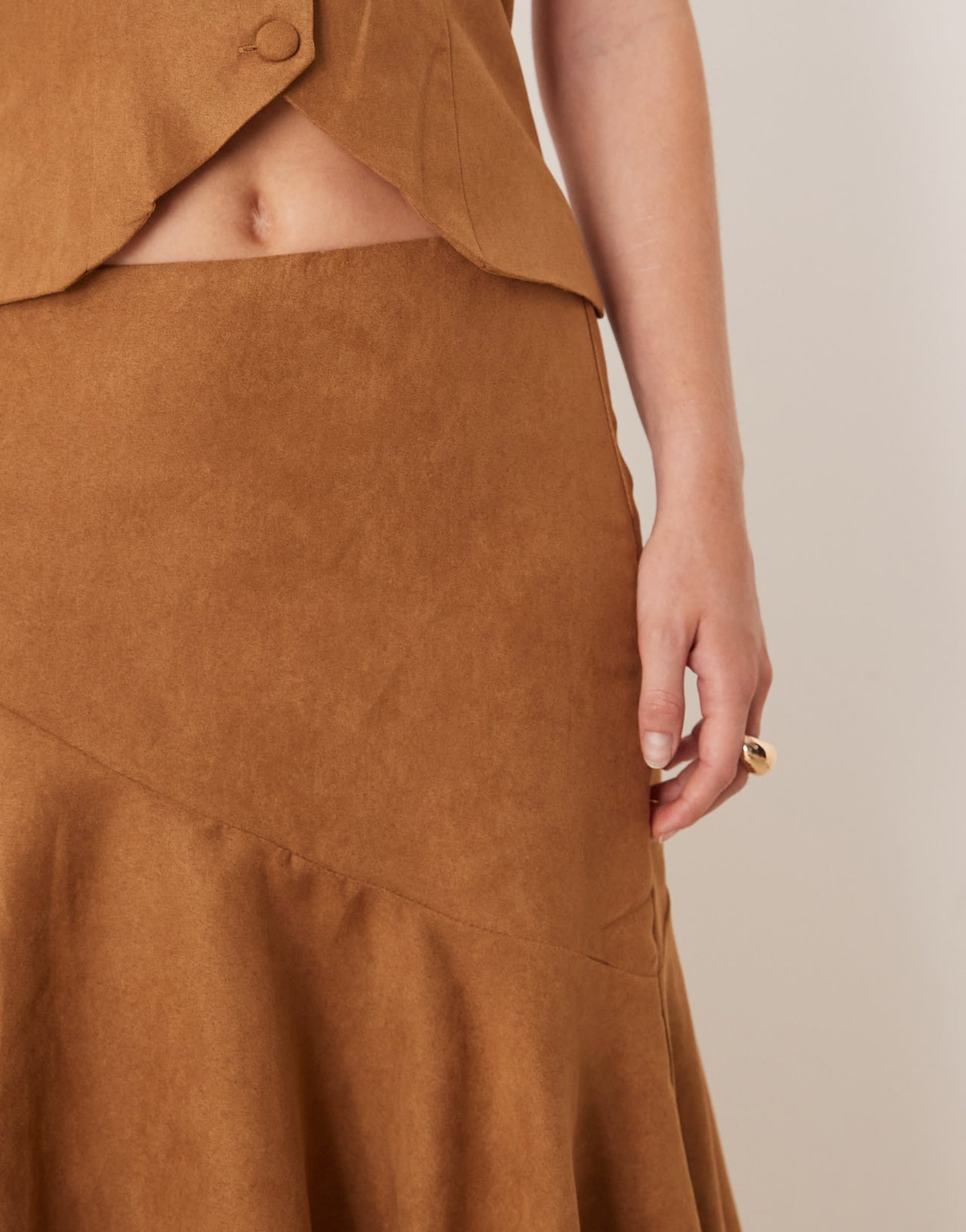 Kiss The Sky low waist asymmetric faux suede midi skirt in brown