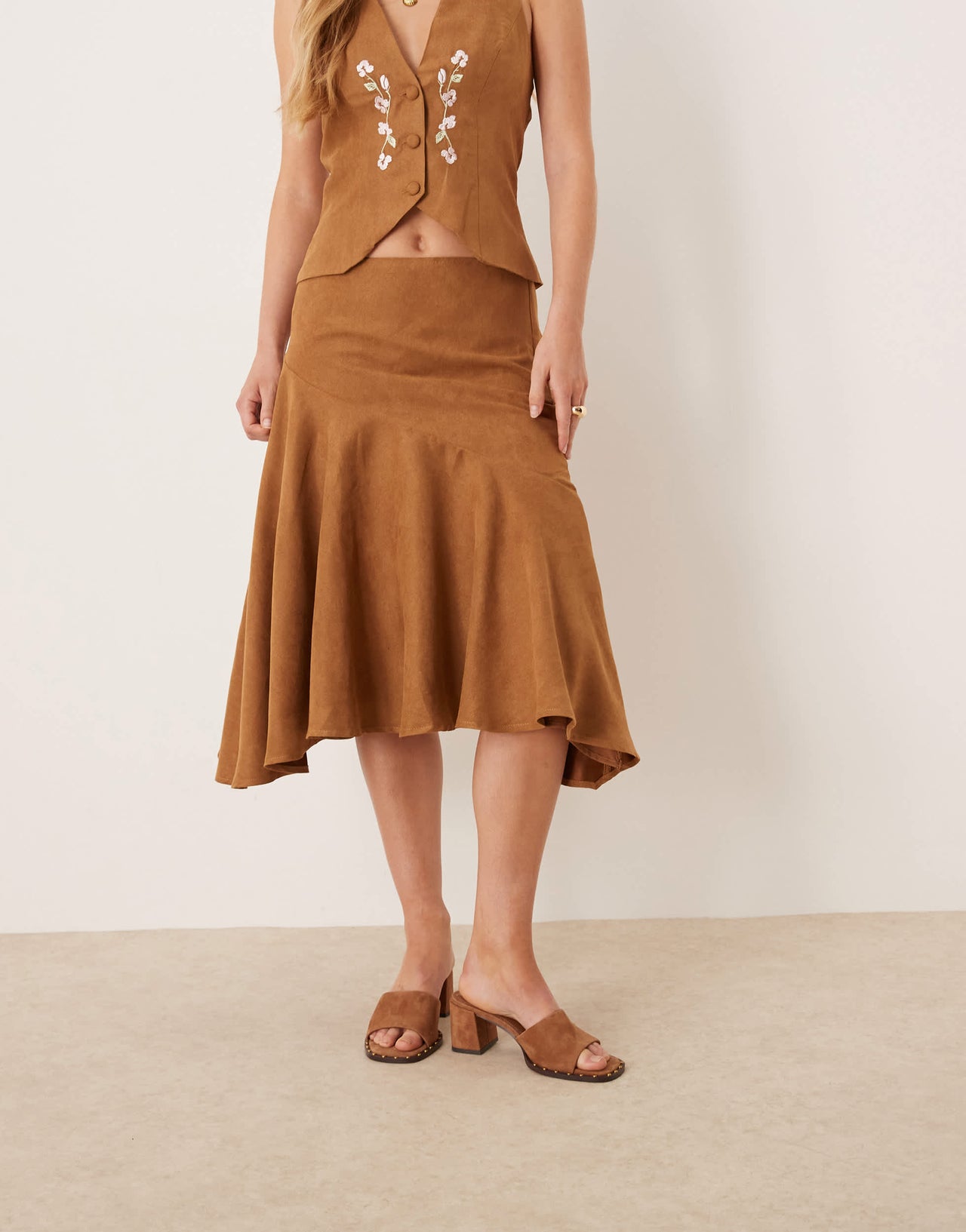 Kiss The Sky low waist asymmetric faux suede midi skirt in brown