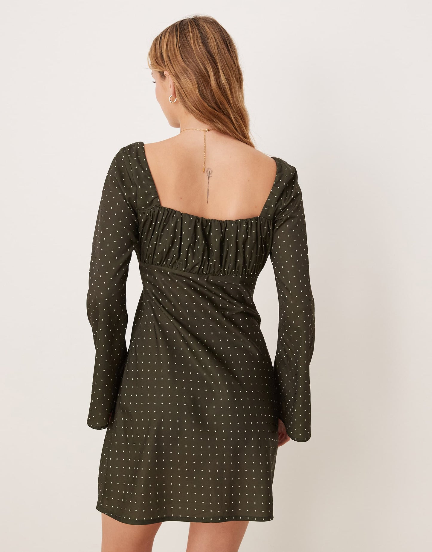 Kiss The Sky polka dot mini dress in forest green