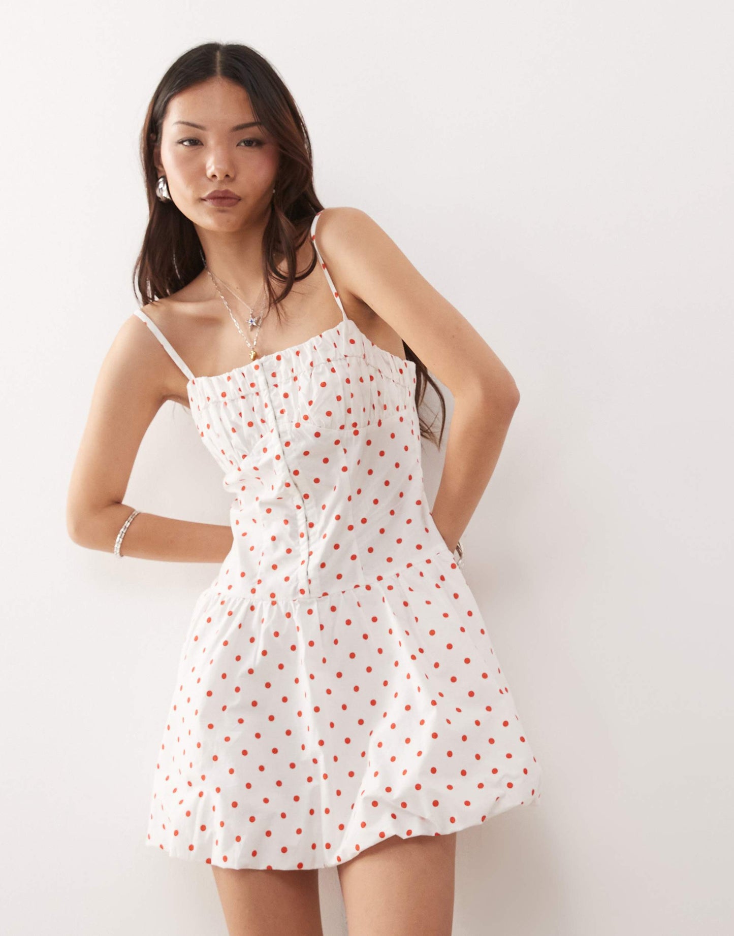 Reclaimed Vintage puffball mini dress with hook and eye in red polka dot print