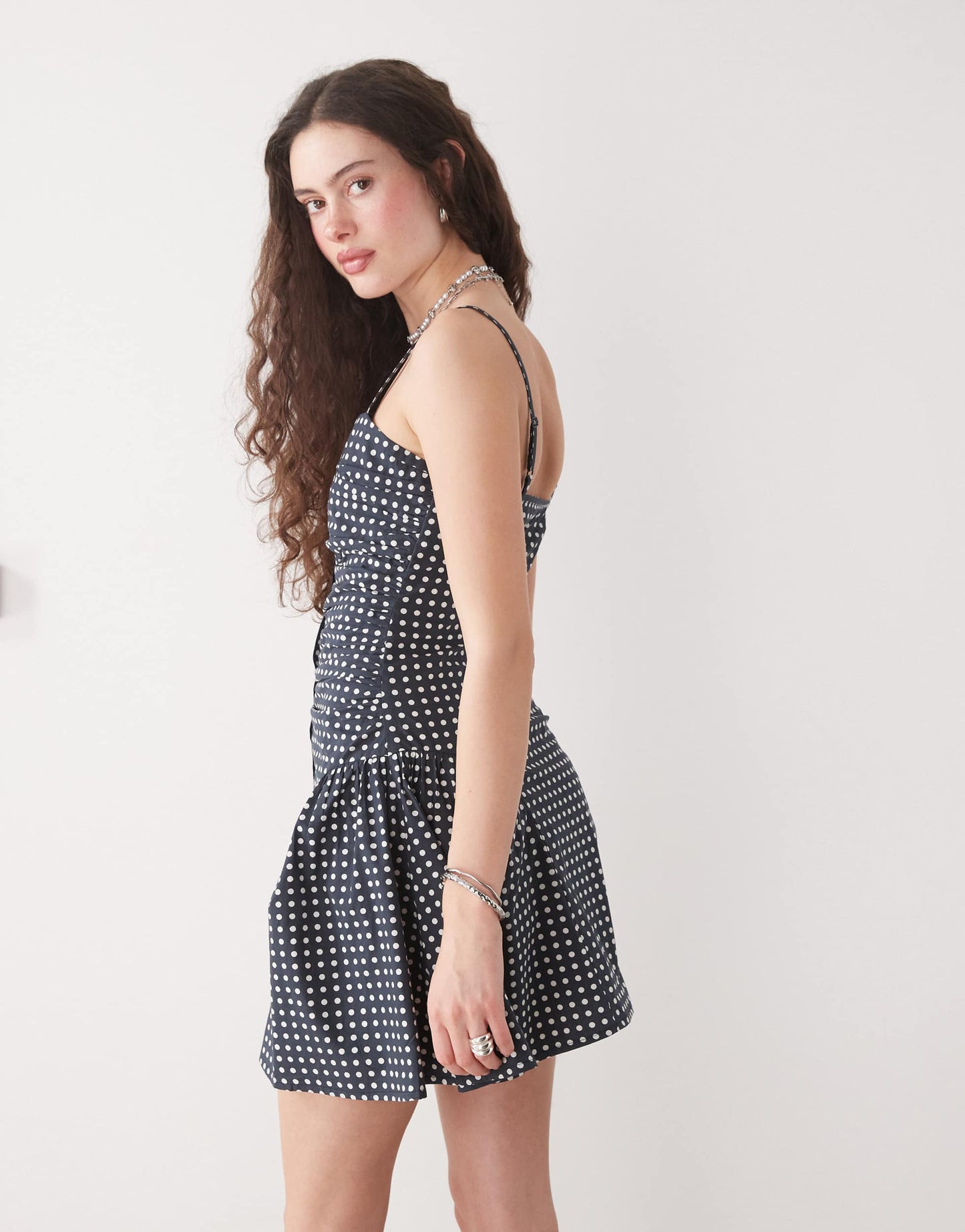 Reclaimed Vintage dropped waist mini sun dress in navy and white polka dot