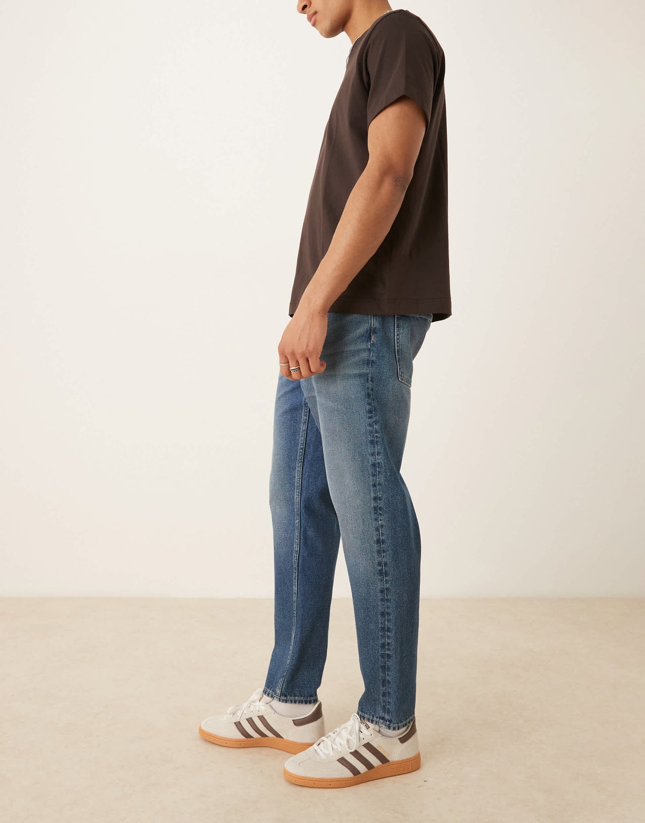 ASOS DESIGN tapered fit jeans with vintage tint in light wash blue