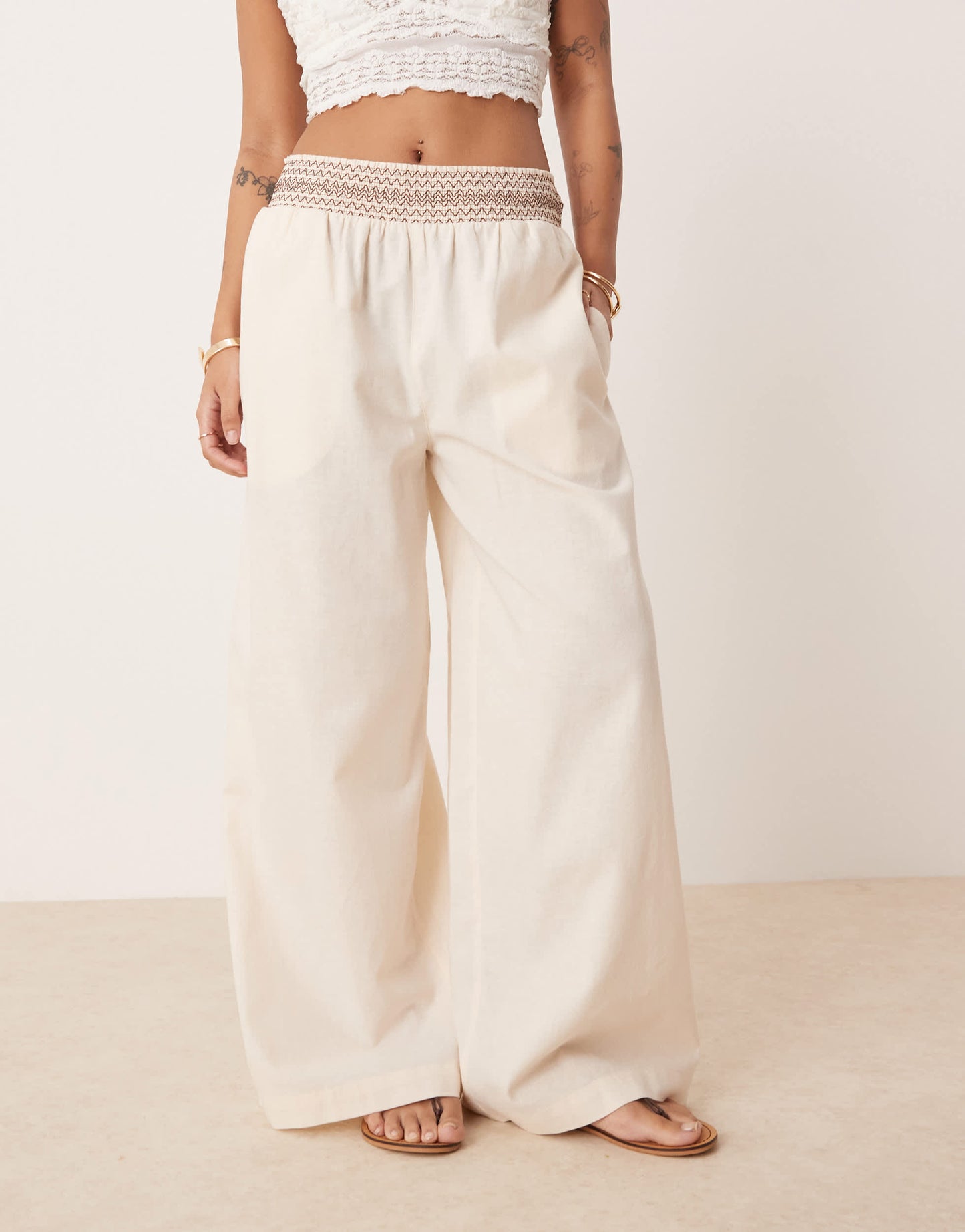 ASOS DESIGN Petite linen blend pull on wide leg trousers with shirred waist detail in cream with brown