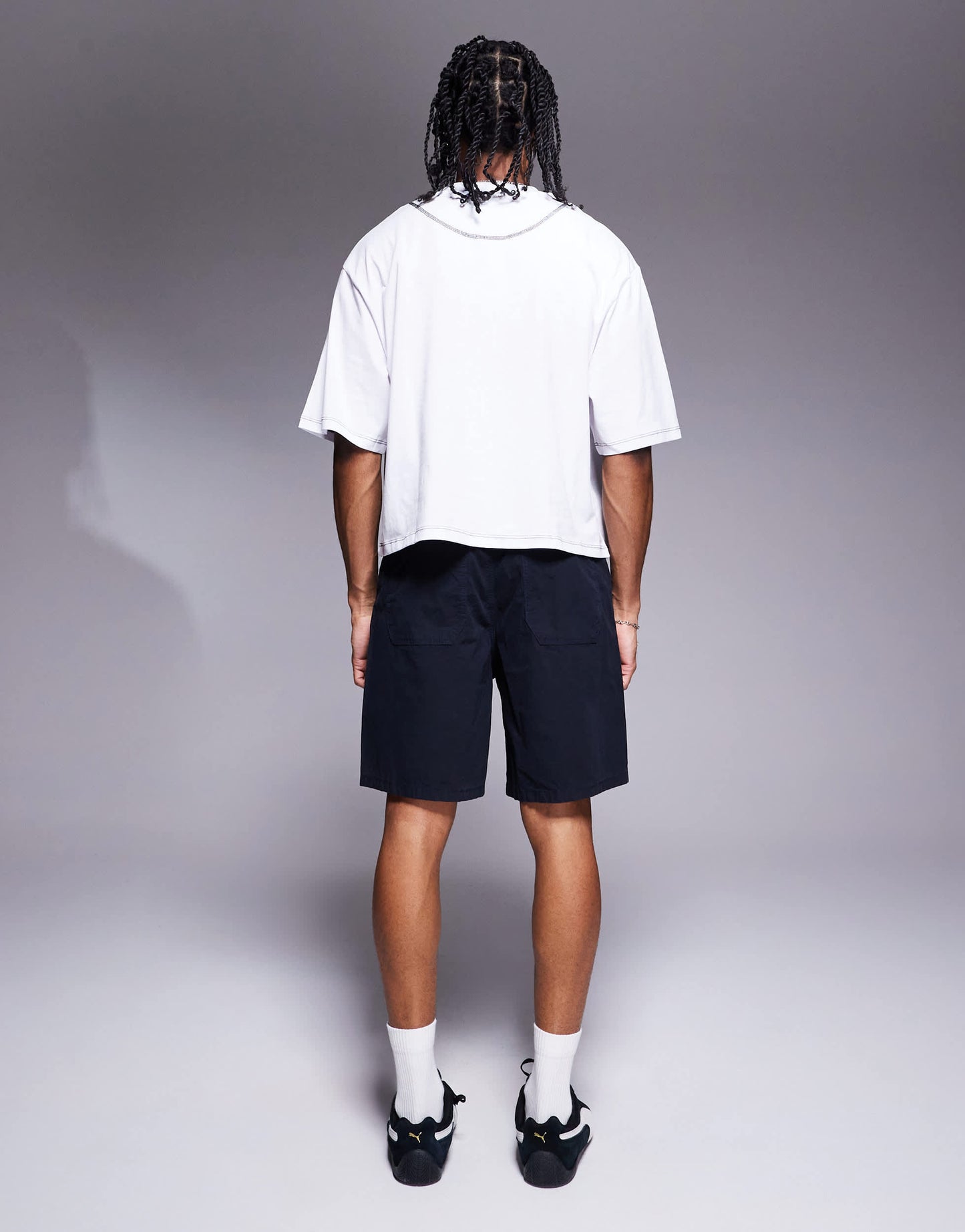 ASOS DESIGN mid length pleated shorts in navy