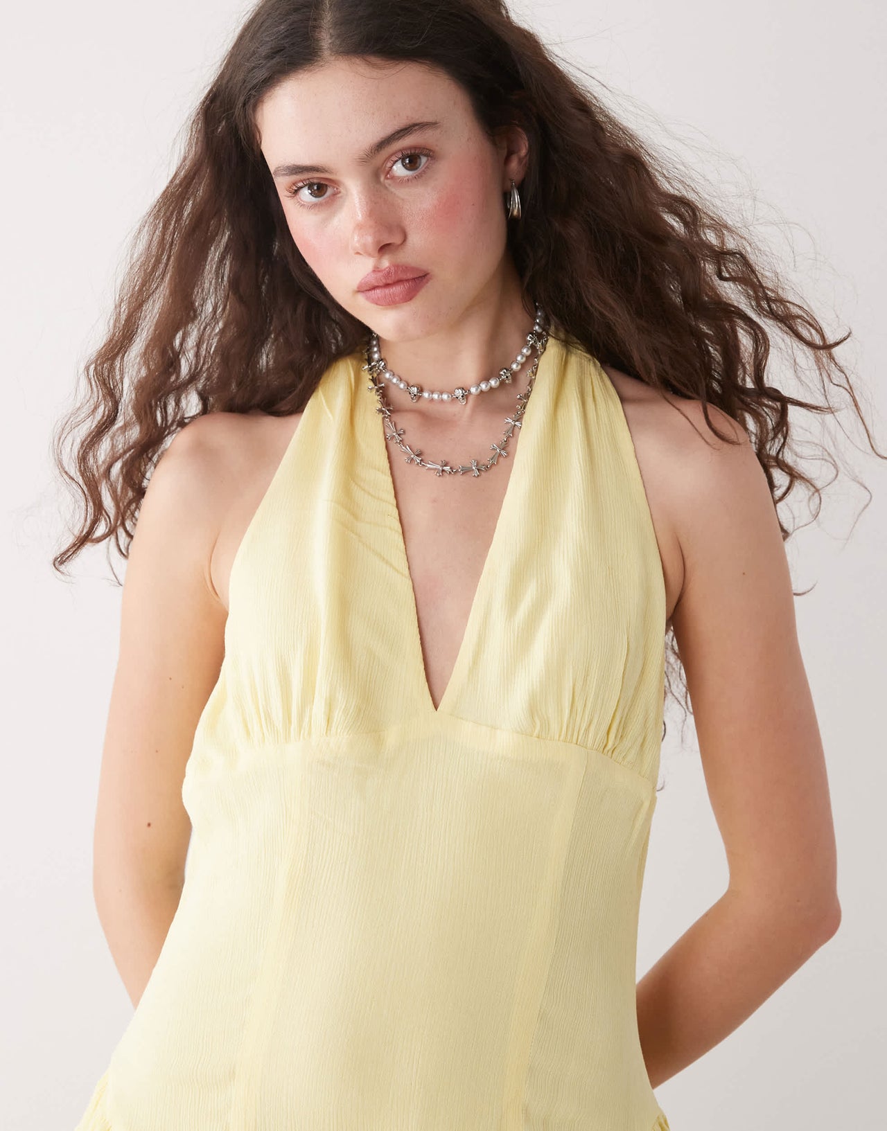 Reclaimed Vintage halter playsuit with ruffle shorts in yellow