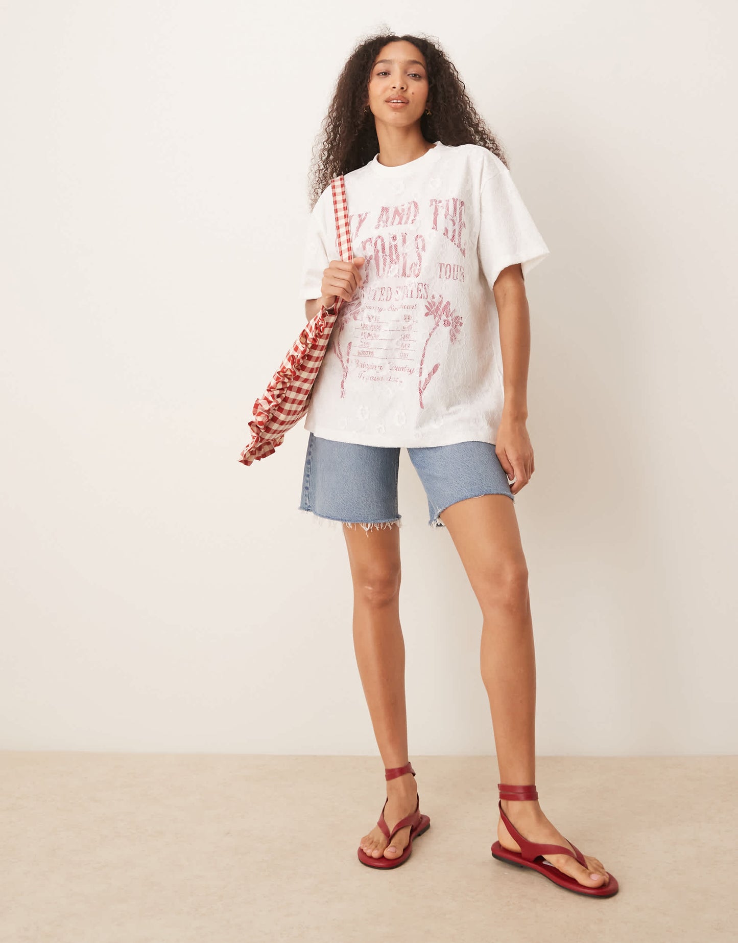 ASOS DESIGN oversized t-shirt with band graphic with lace overlay in white