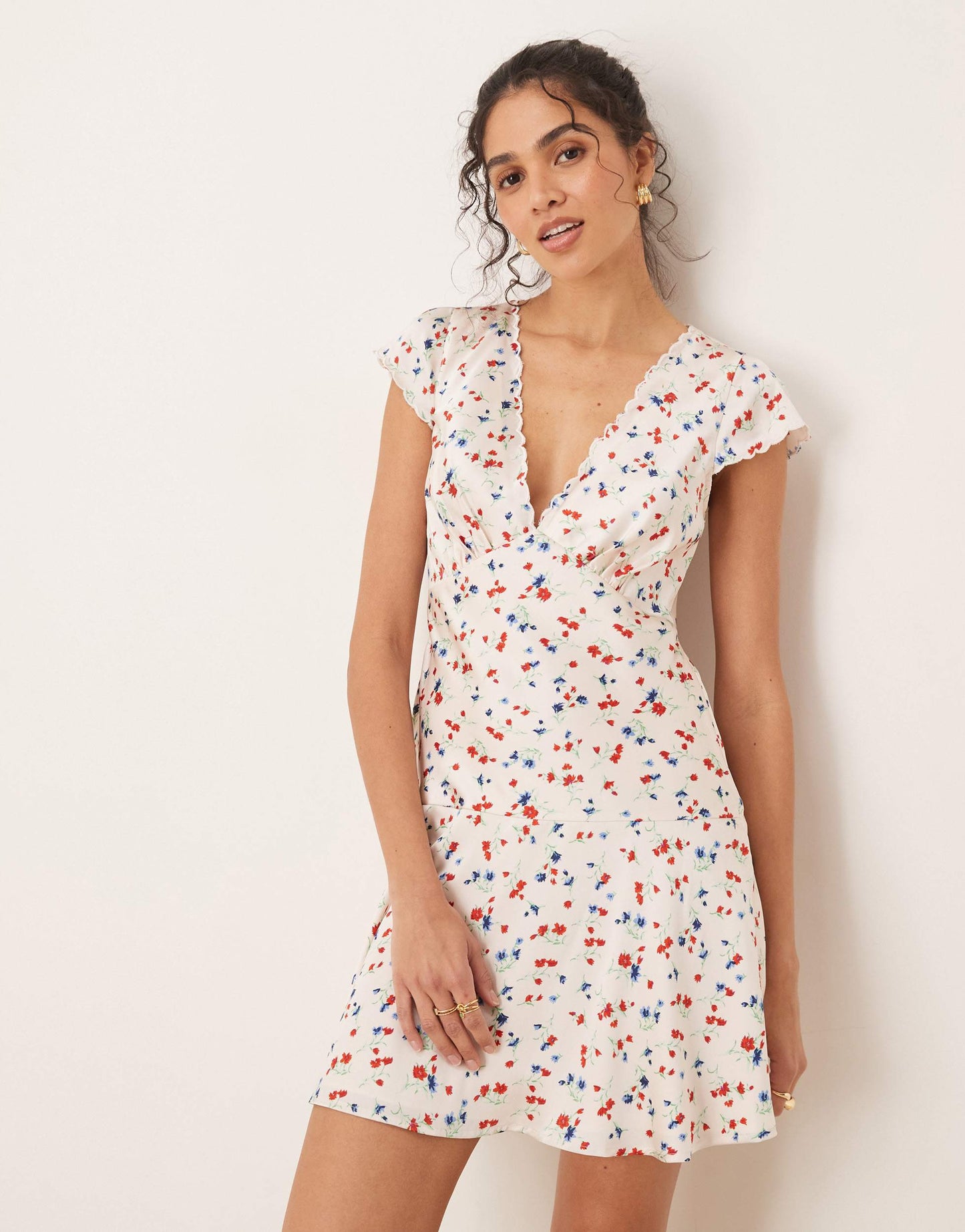 ASOS DESIGN satin flippy mini dress with scallop trim in ditsy floral