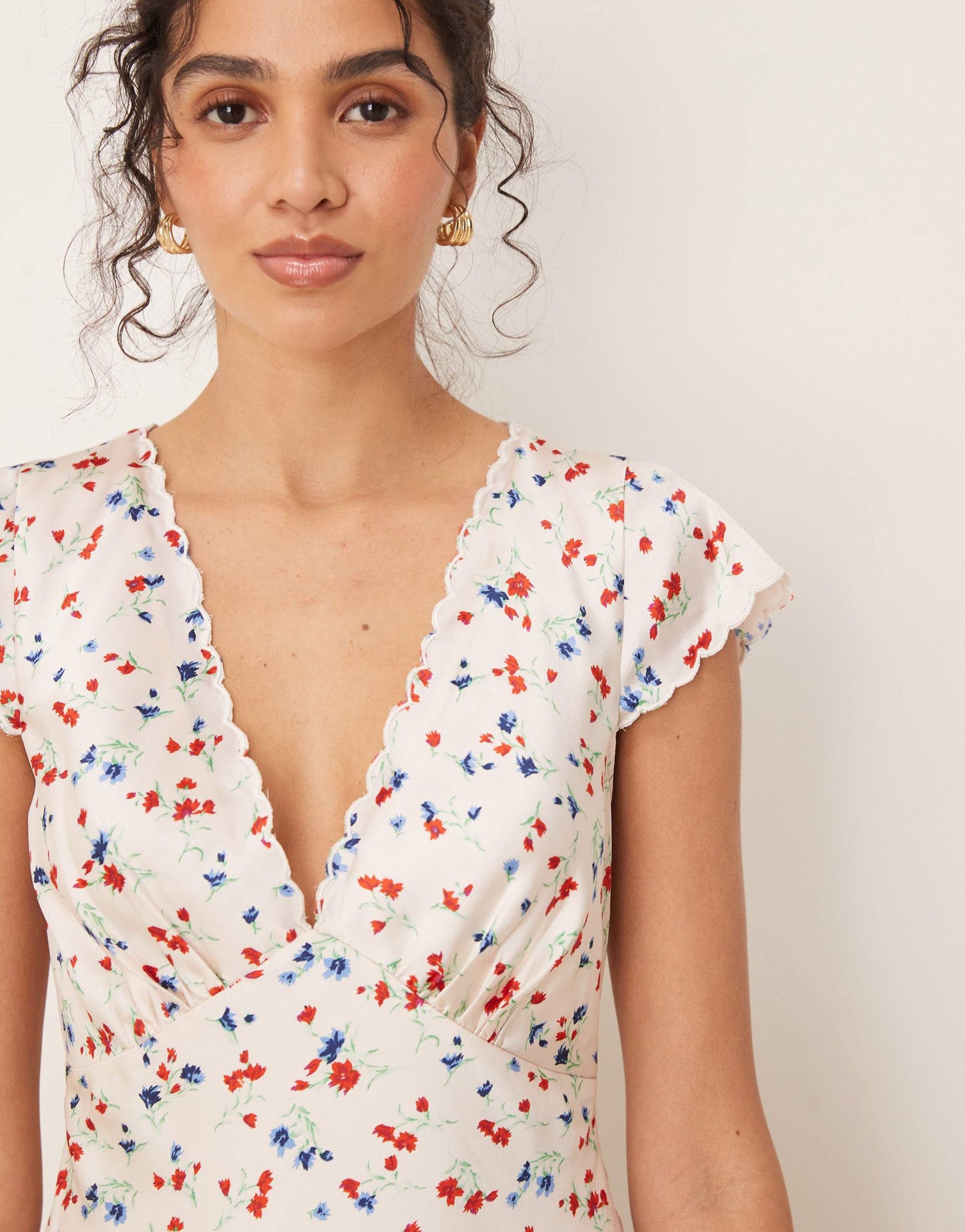ASOS DESIGN satin flippy mini dress with scallop trim in ditsy floral