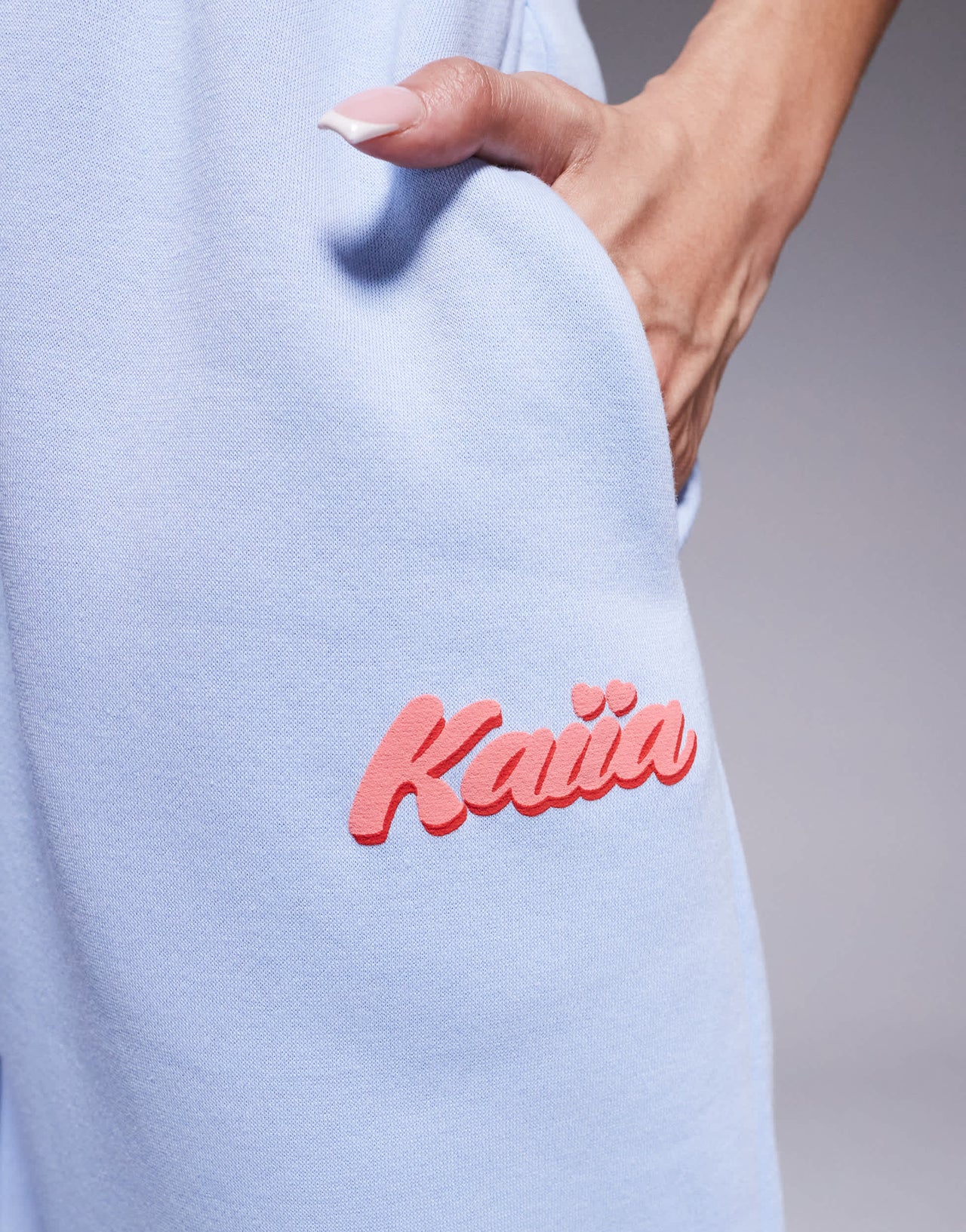 Kaiia cotton blend puff printed logo cuffed jogger co-ord in light blue and red