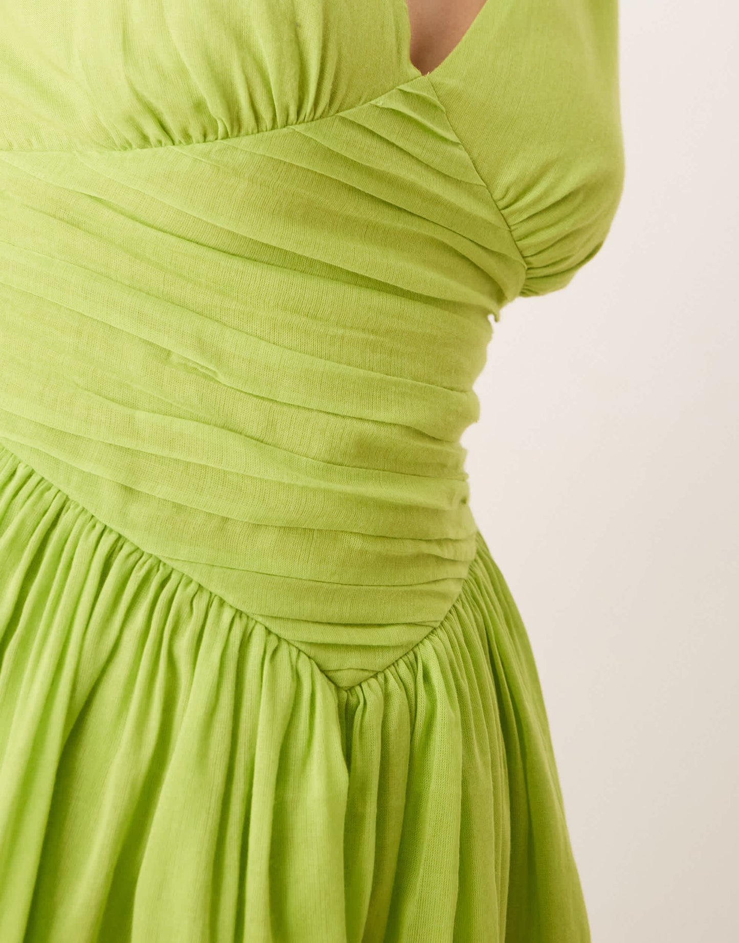 ASOS DESIGN v neck mini sundress with hanky hem in kiwi green