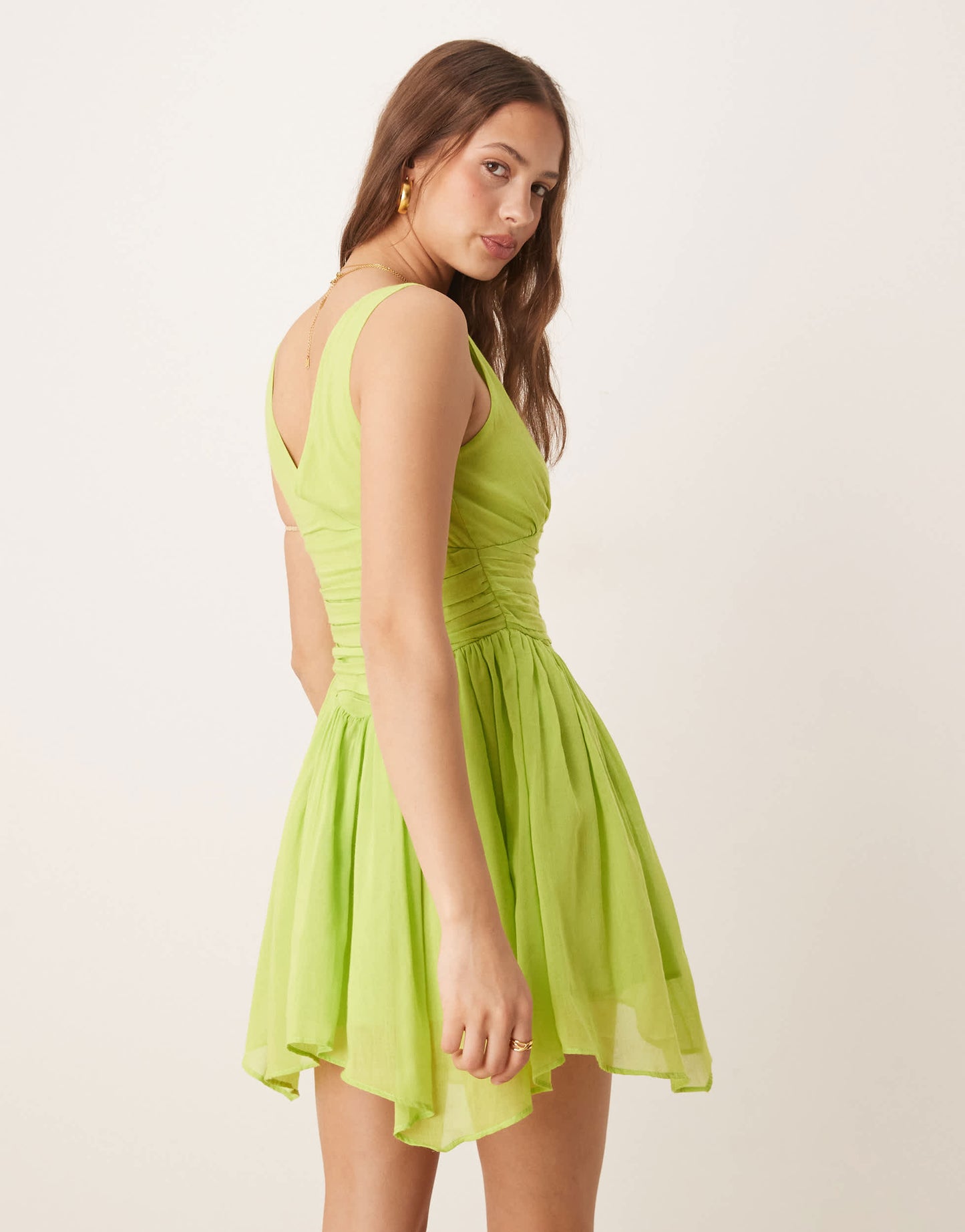 ASOS DESIGN v neck mini sundress with hanky hem in kiwi green