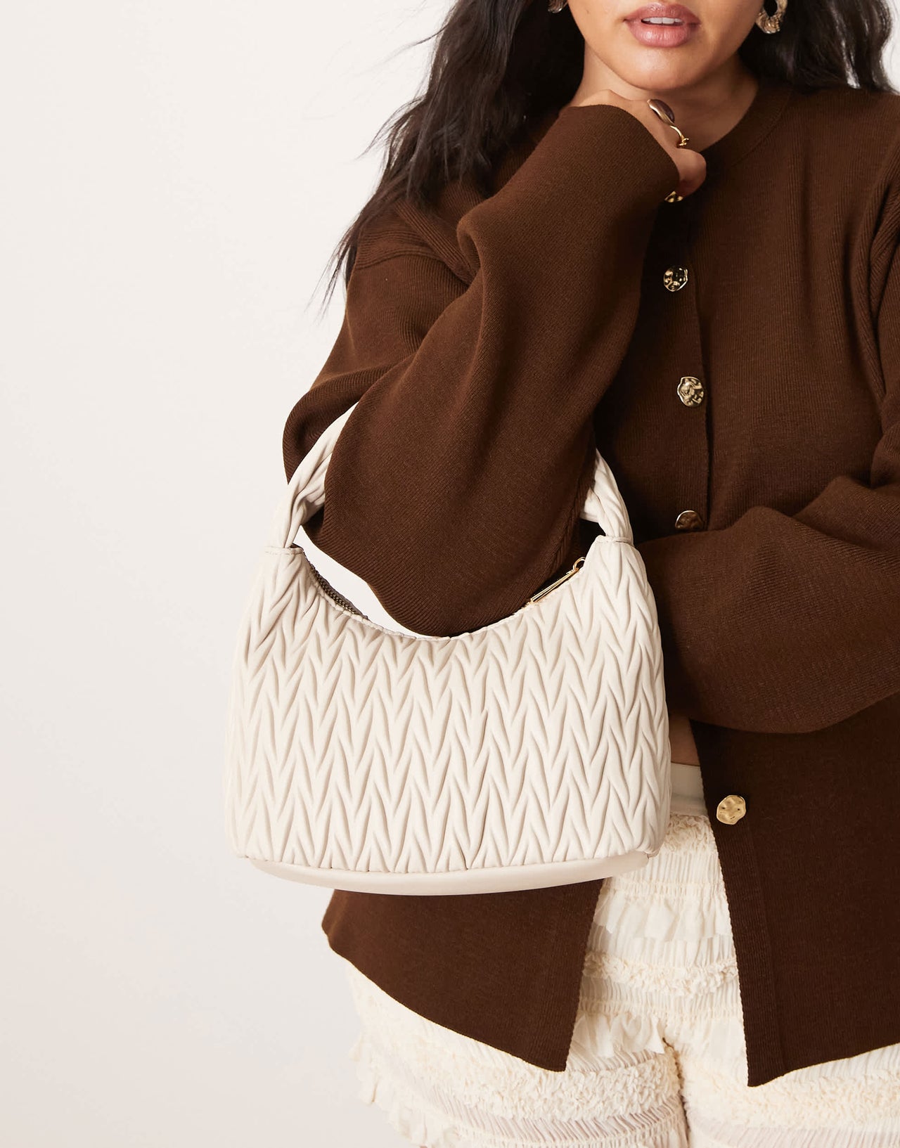 Accessorize quilted handheld bag in cream