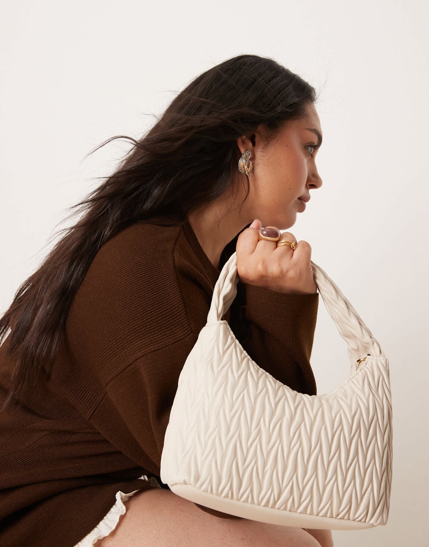 Accessorize quilted handheld bag in cream