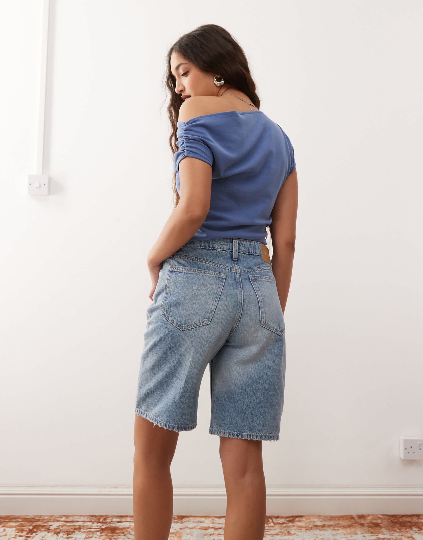 Weekday low waist knee length denim shorts in blue
