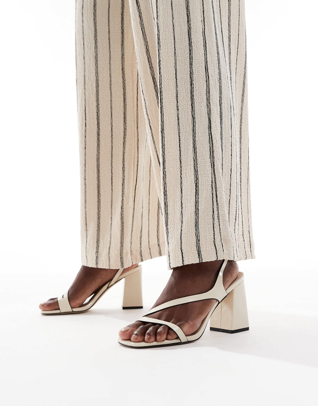 RAID Aubrey block heeled sandals in off white PU
