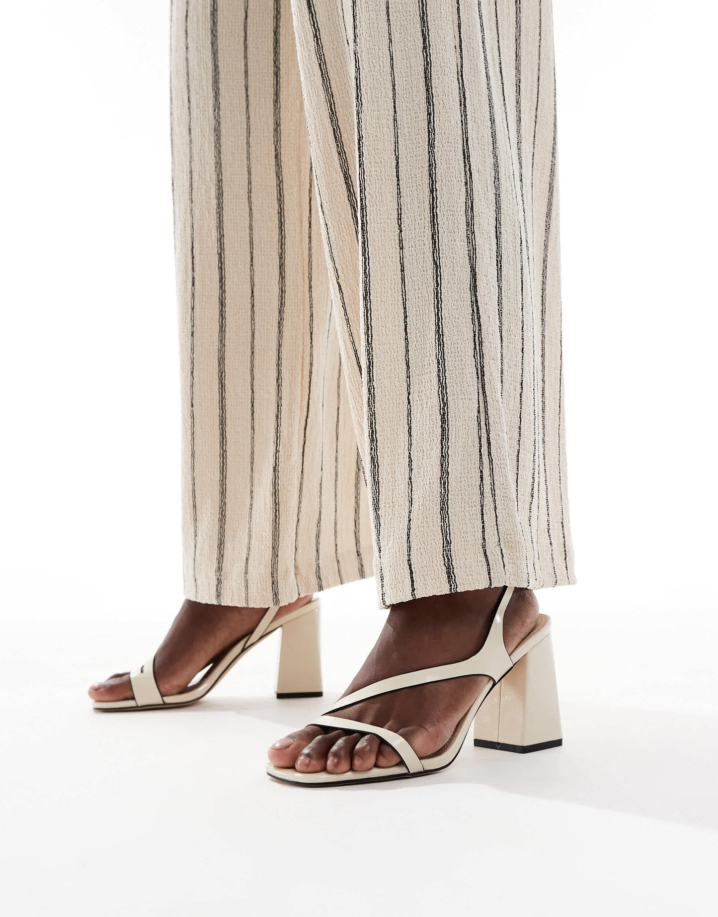 RAID Aubrey block heeled sandals in off white PU