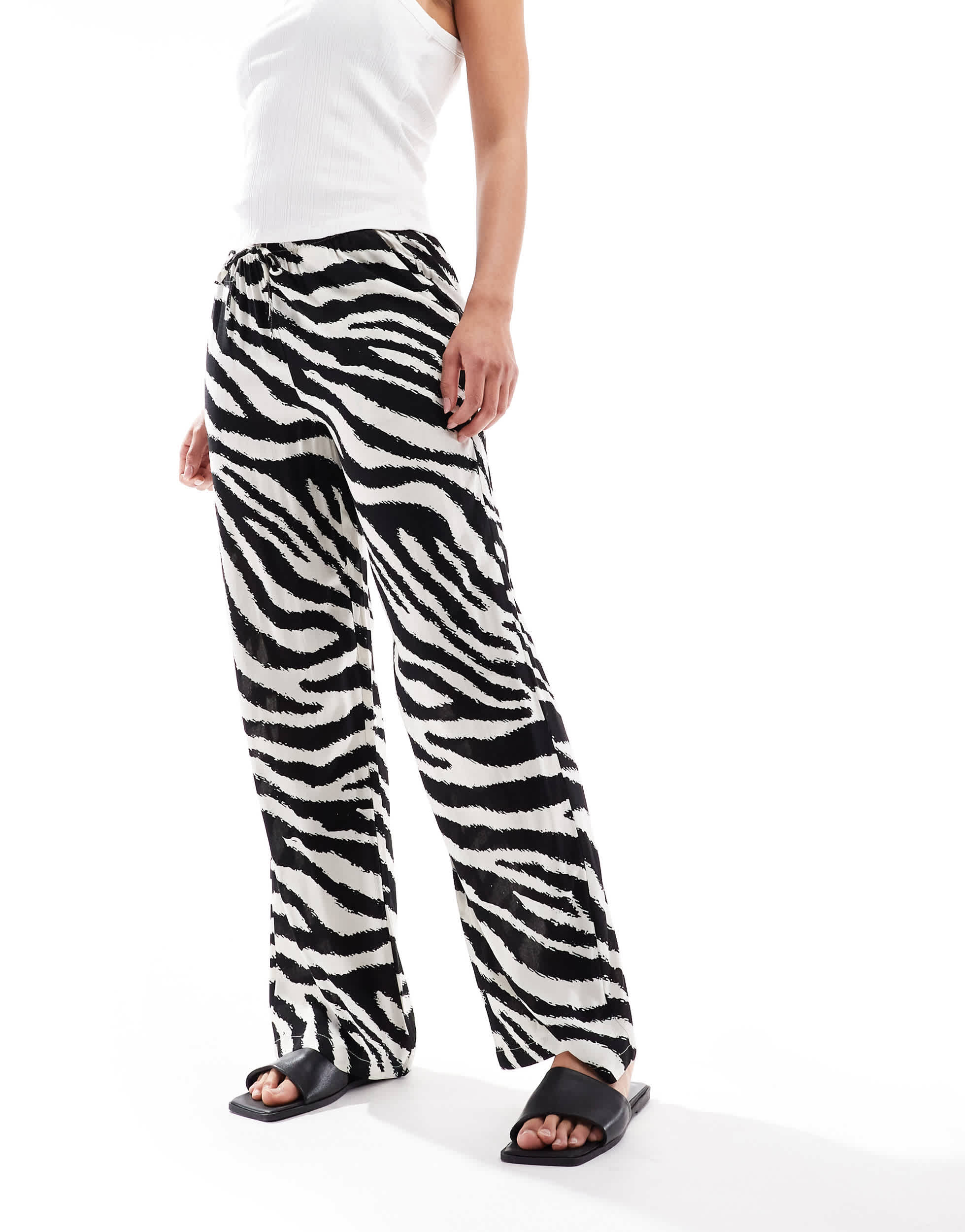 Vero Moda Easy tie waist wide leg trousers in zebra print