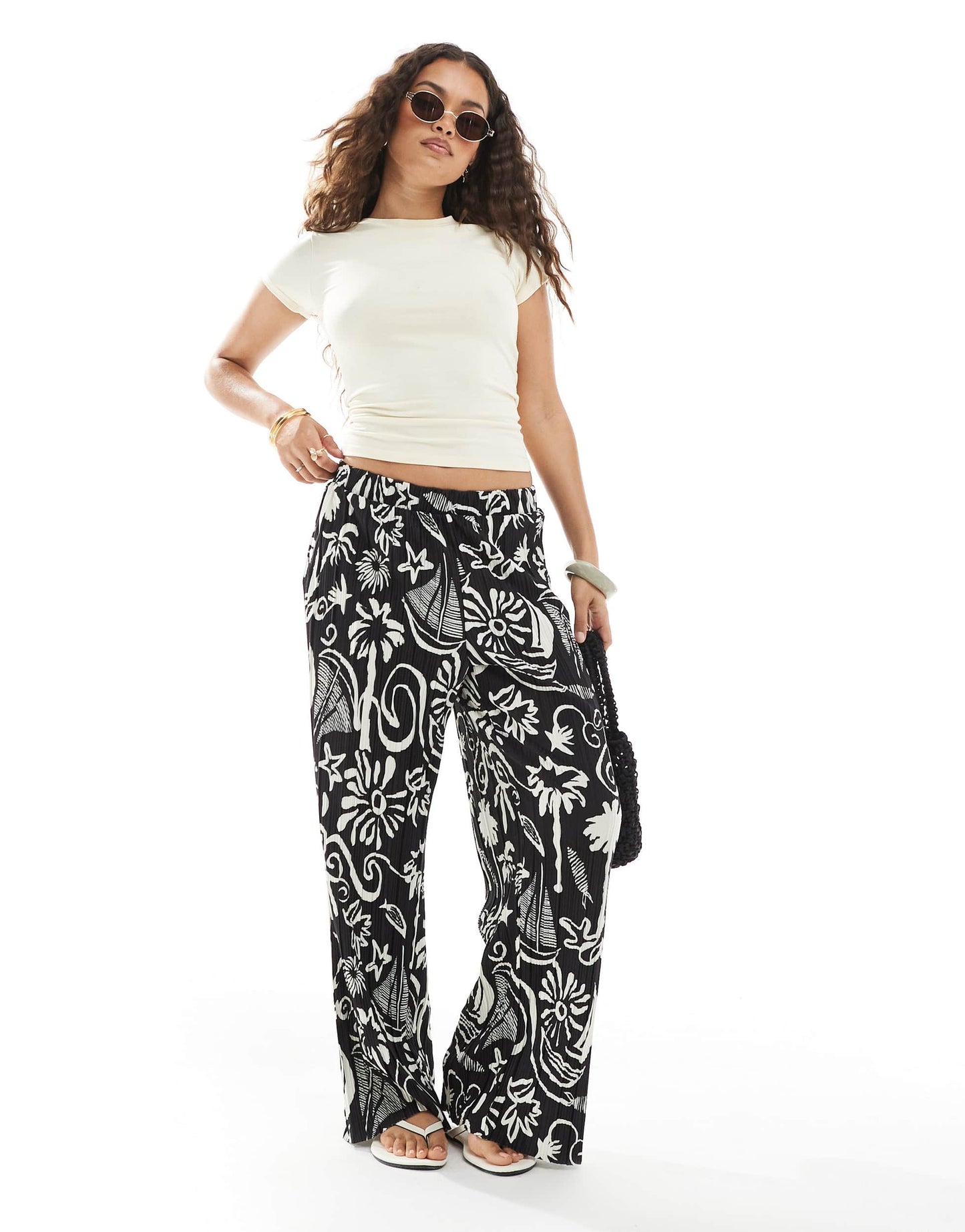 Vero Moda Petite high waist wide leg plisse trouser in tropical conversational print