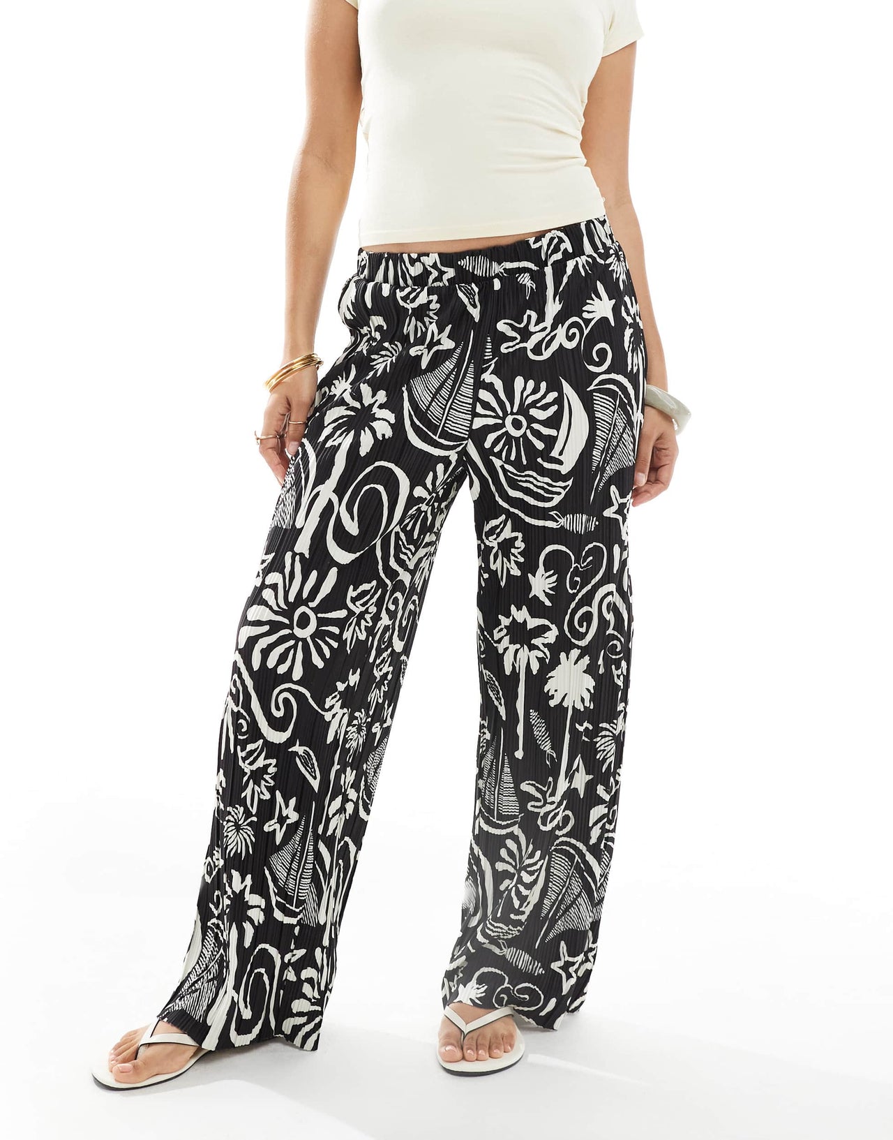 Vero Moda Petite high waist wide leg plisse trouser in tropical conversational print