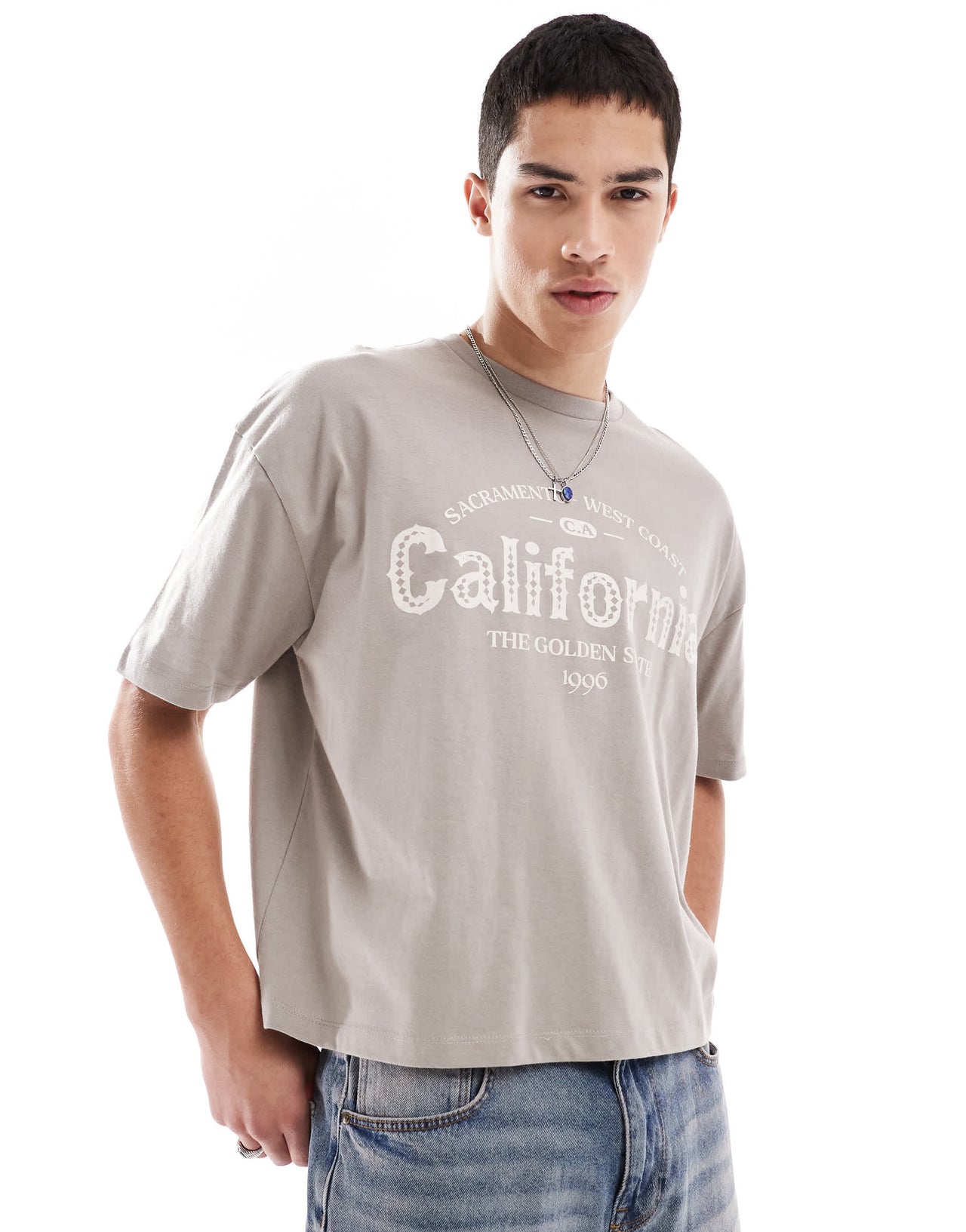 ASOS DESIGN boxy oversized t-shirt with city graphic in brown