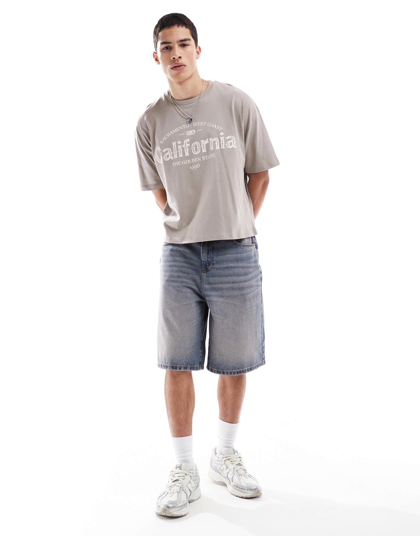 ASOS DESIGN boxy oversized t-shirt with city graphic in brown
