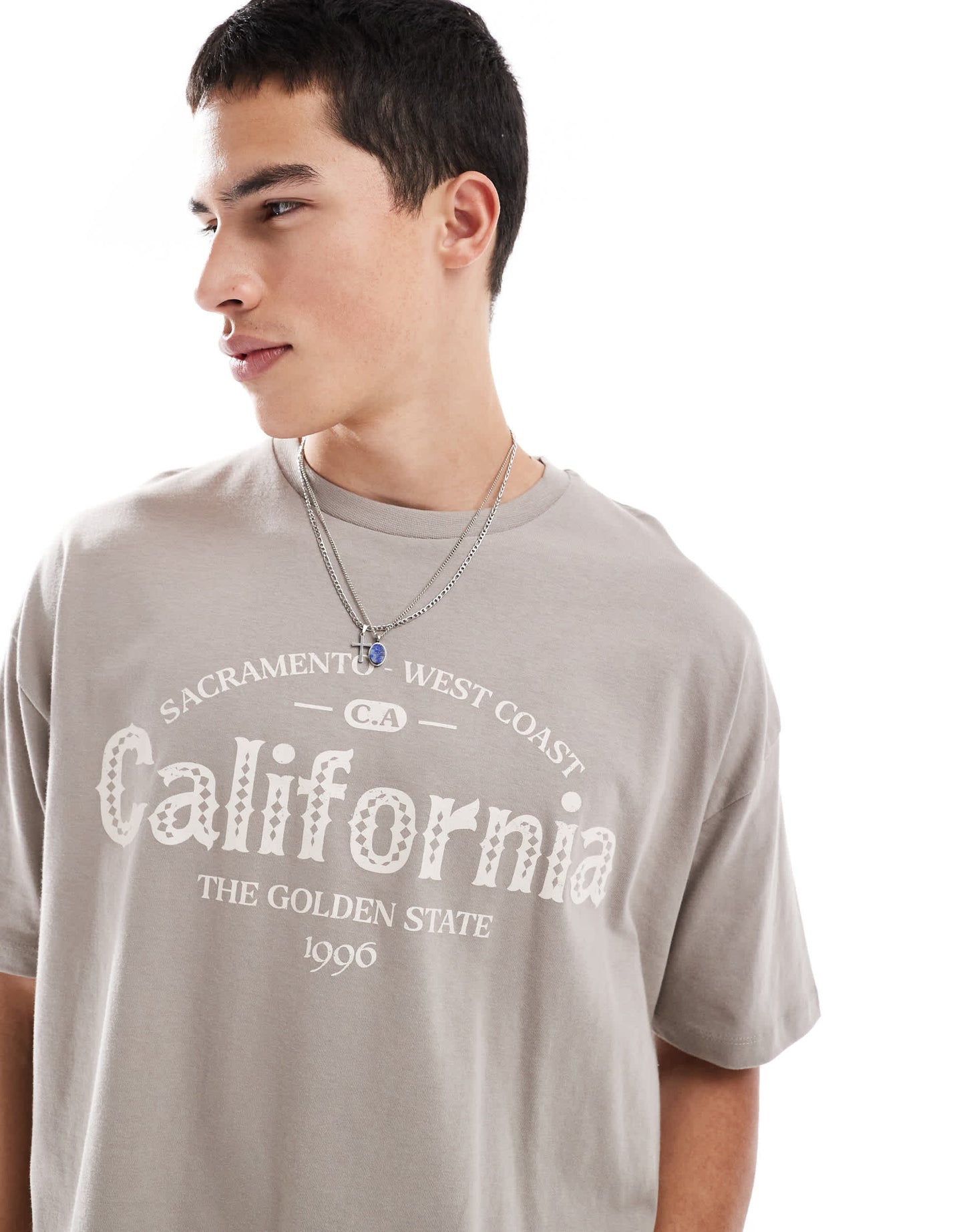ASOS DESIGN boxy oversized t-shirt with city graphic in brown
