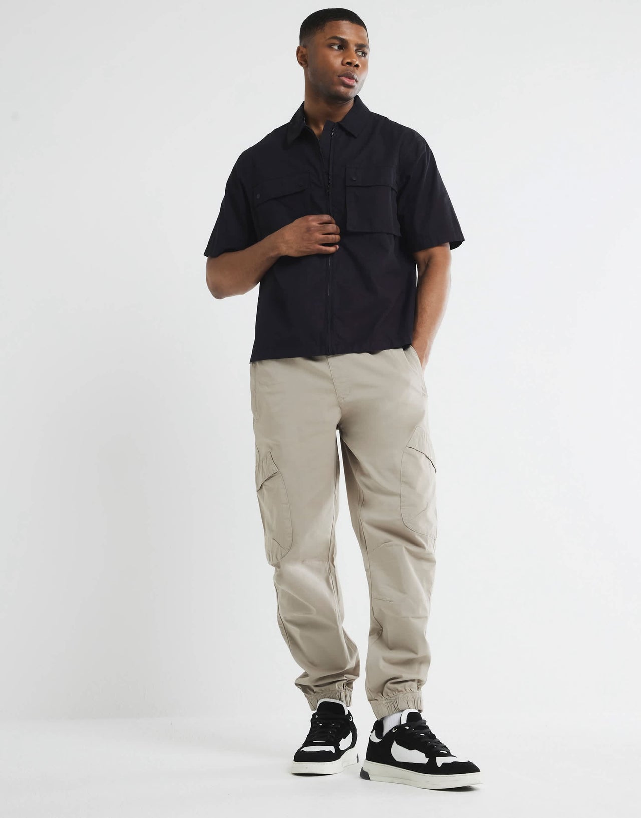 River Island cuffed cargo trousers in medium stone