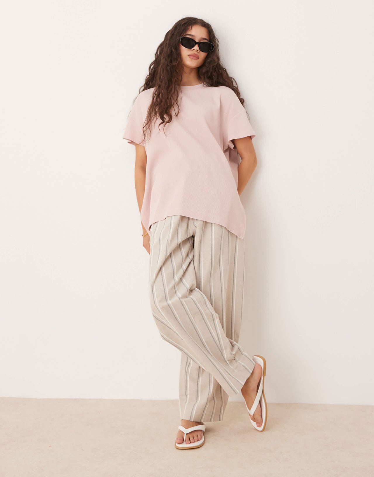 ASOS DESIGN extreme hem oversized waffle t-shirt in washed pink