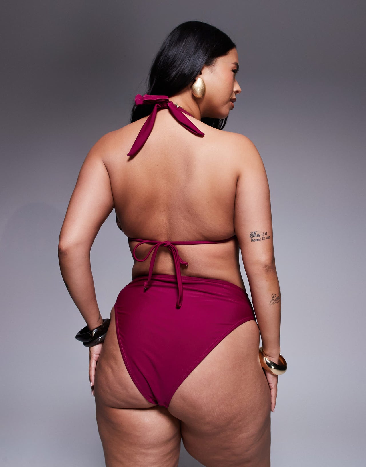 Moda Minx Curve bikini bottom with gold hardware detail in berry