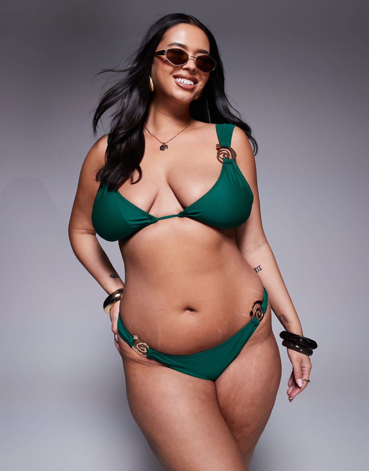 Moda Minx Curve tie side bikini bottom with gold hardware detail in green