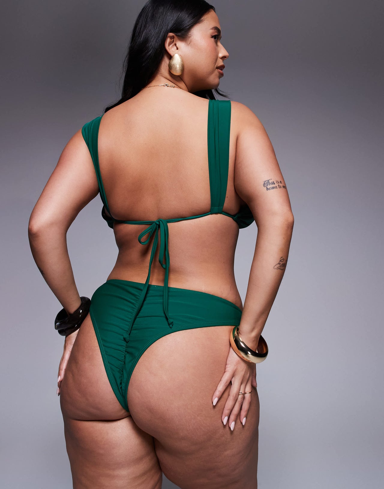 Moda Minx Curve tie side bikini bottom with gold hardware detail in green