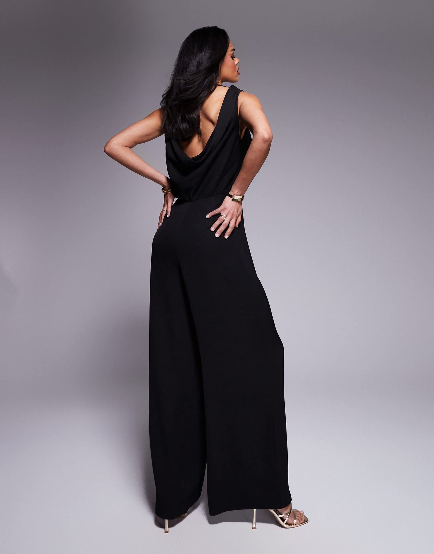 ASOS DESIGN cowl neck wide leg jumpsuit with gold hardware in black