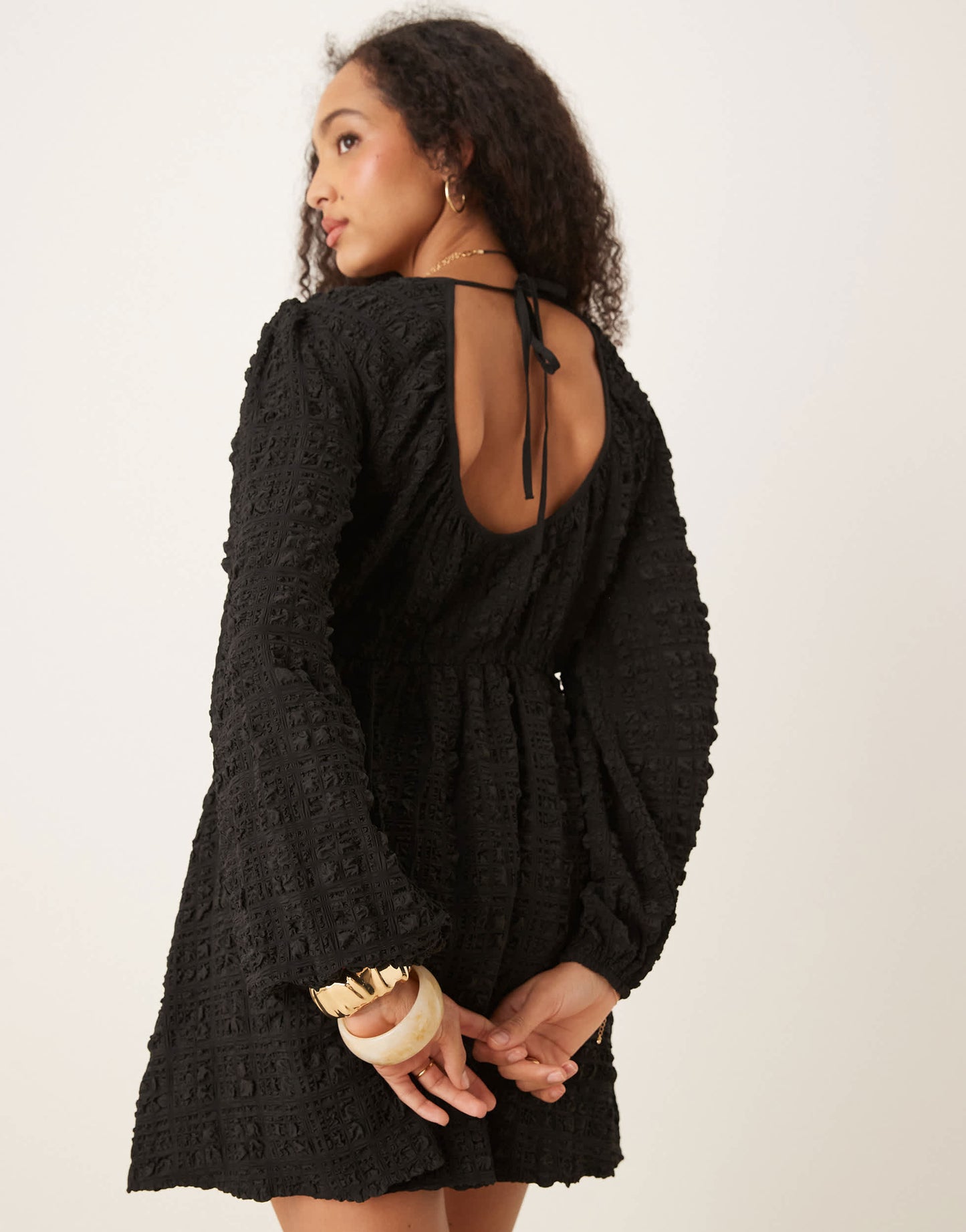 Gina Tricot textured mini dress with open tie back and volume sleeves in black