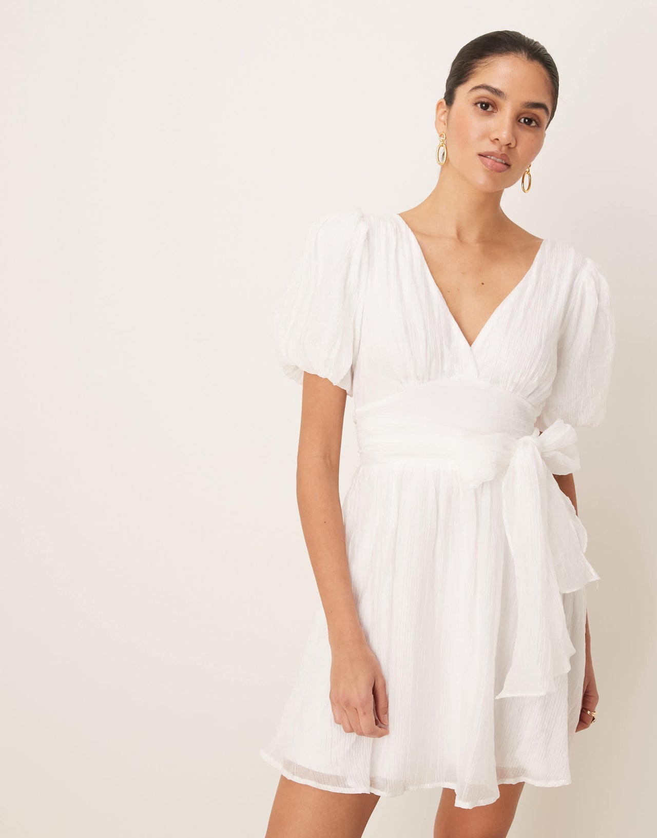 Gina Tricot short sleeve v neck open back bow graduation mini dress in off white