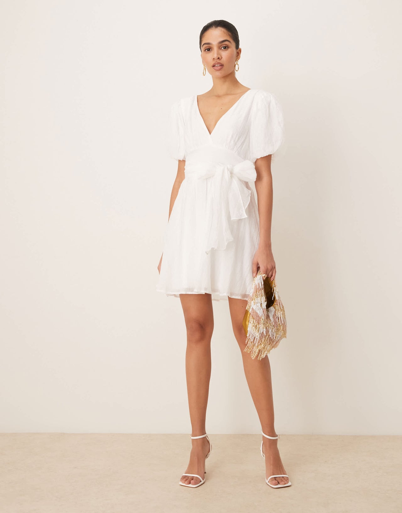 Gina Tricot short sleeve v neck open back bow graduation mini dress in off white