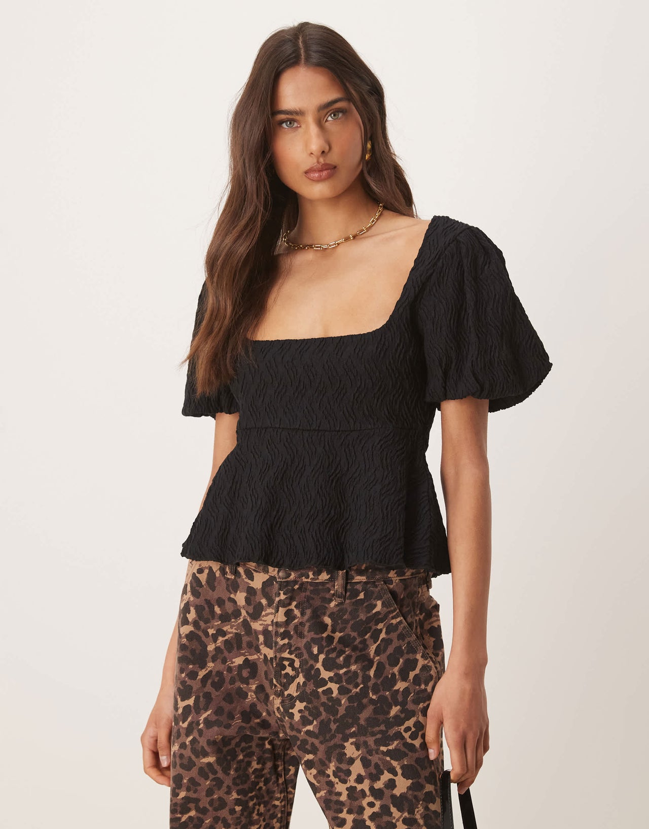 Gina Tricot wavy textured jersey with puff sleeves and peplum hem in black