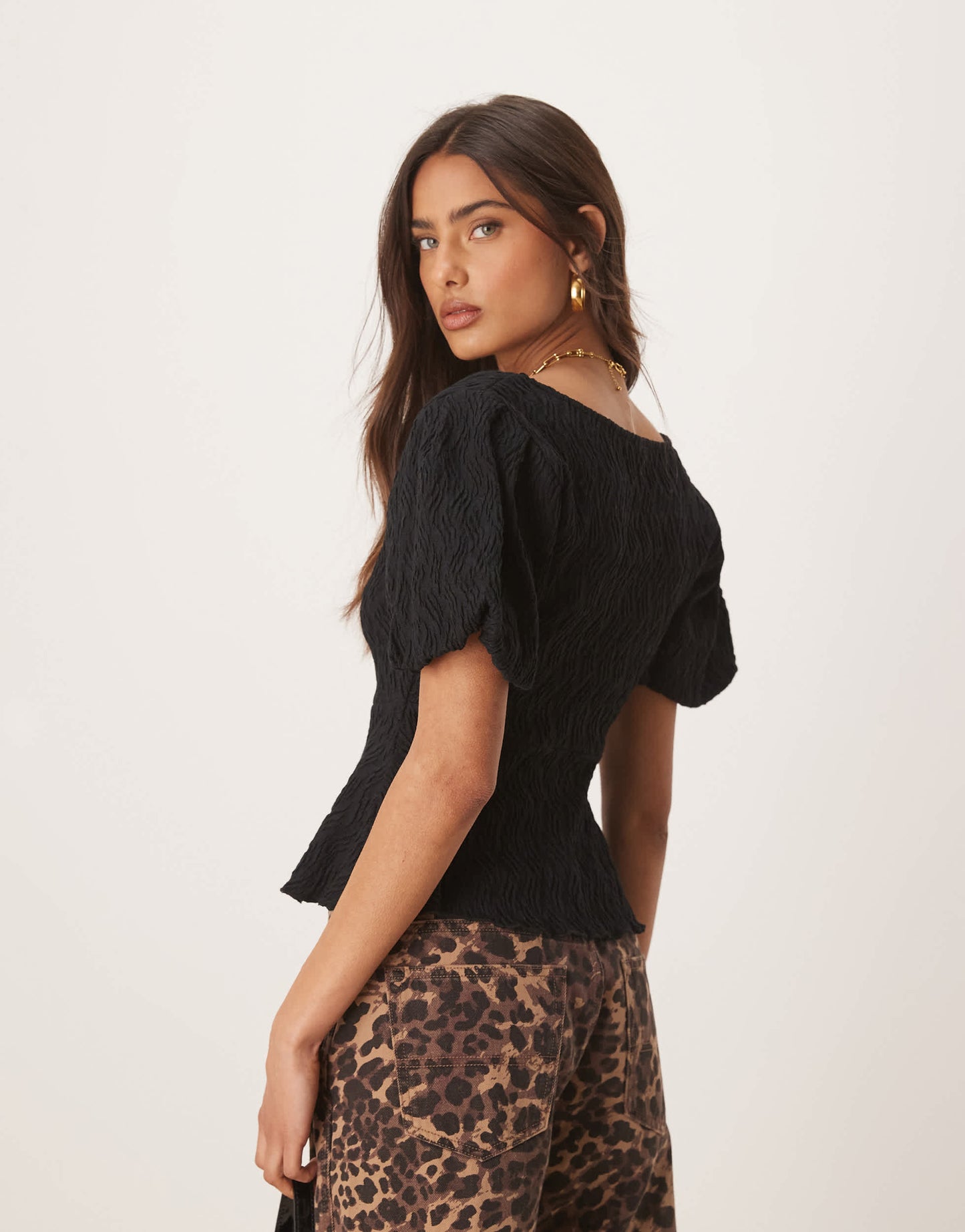 Gina Tricot wavy textured jersey with puff sleeves and peplum hem in black