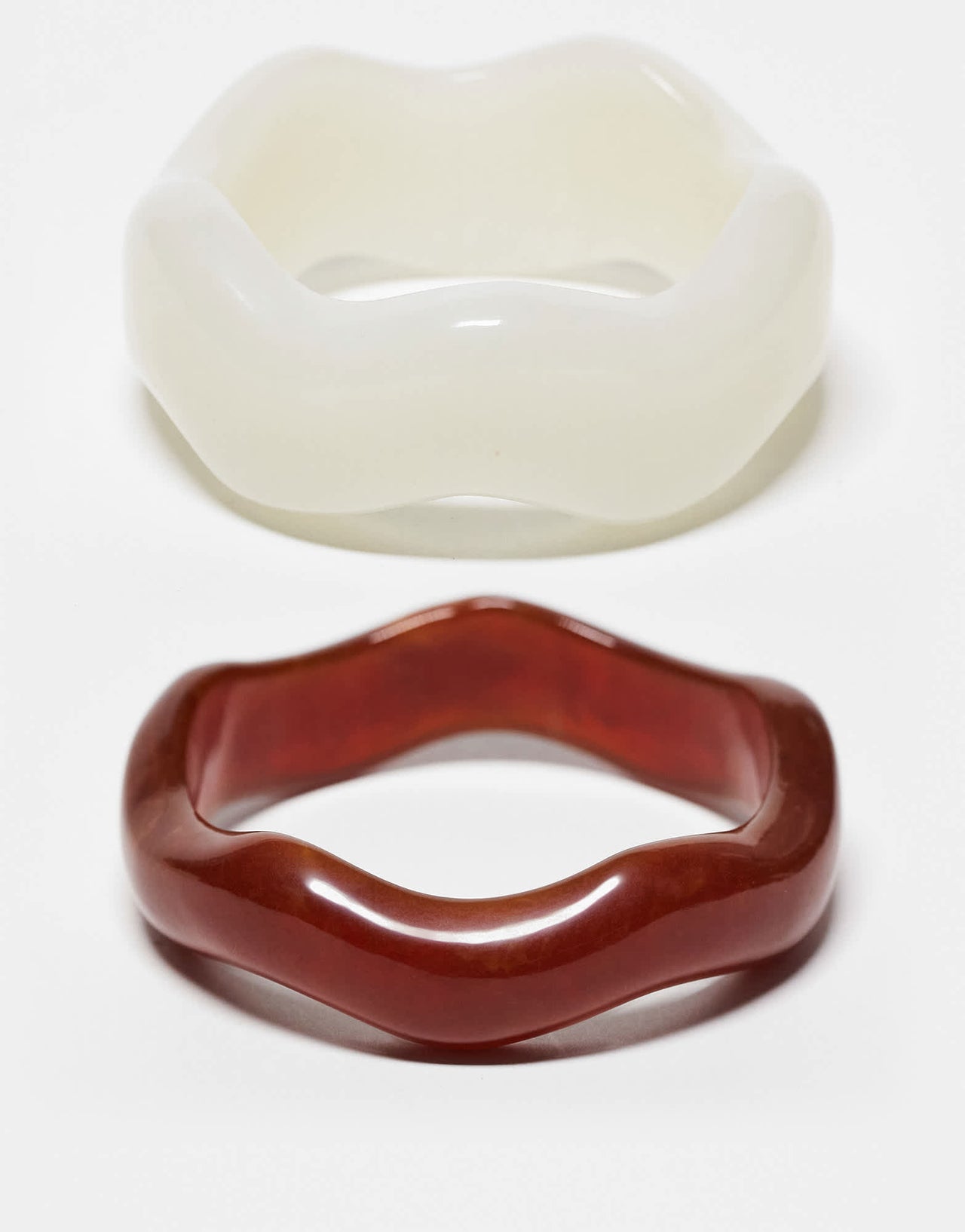 ASOS DESIGN pack of 2 resin bangles in wavy design