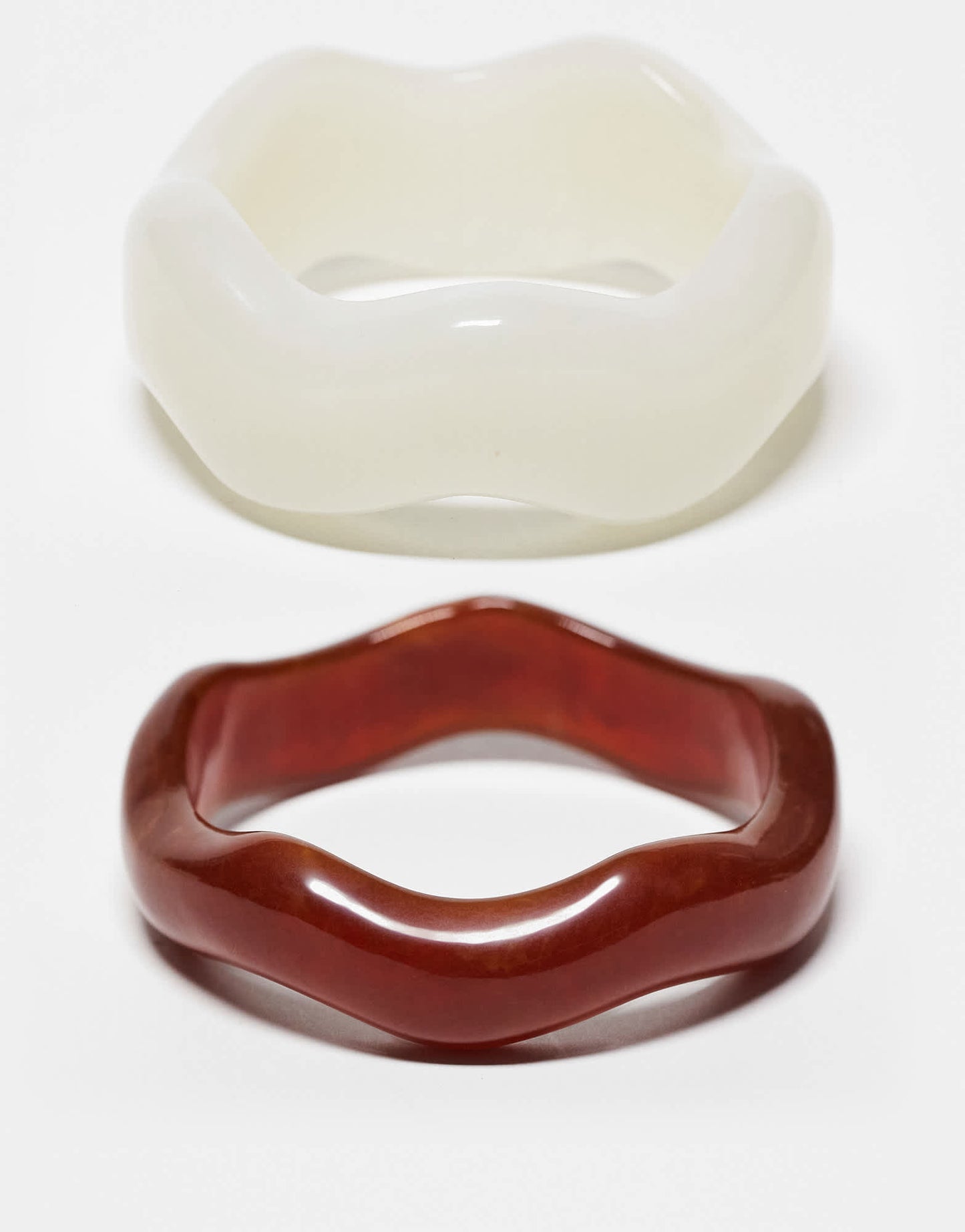 ASOS DESIGN pack of 2 resin bangles in wavy design