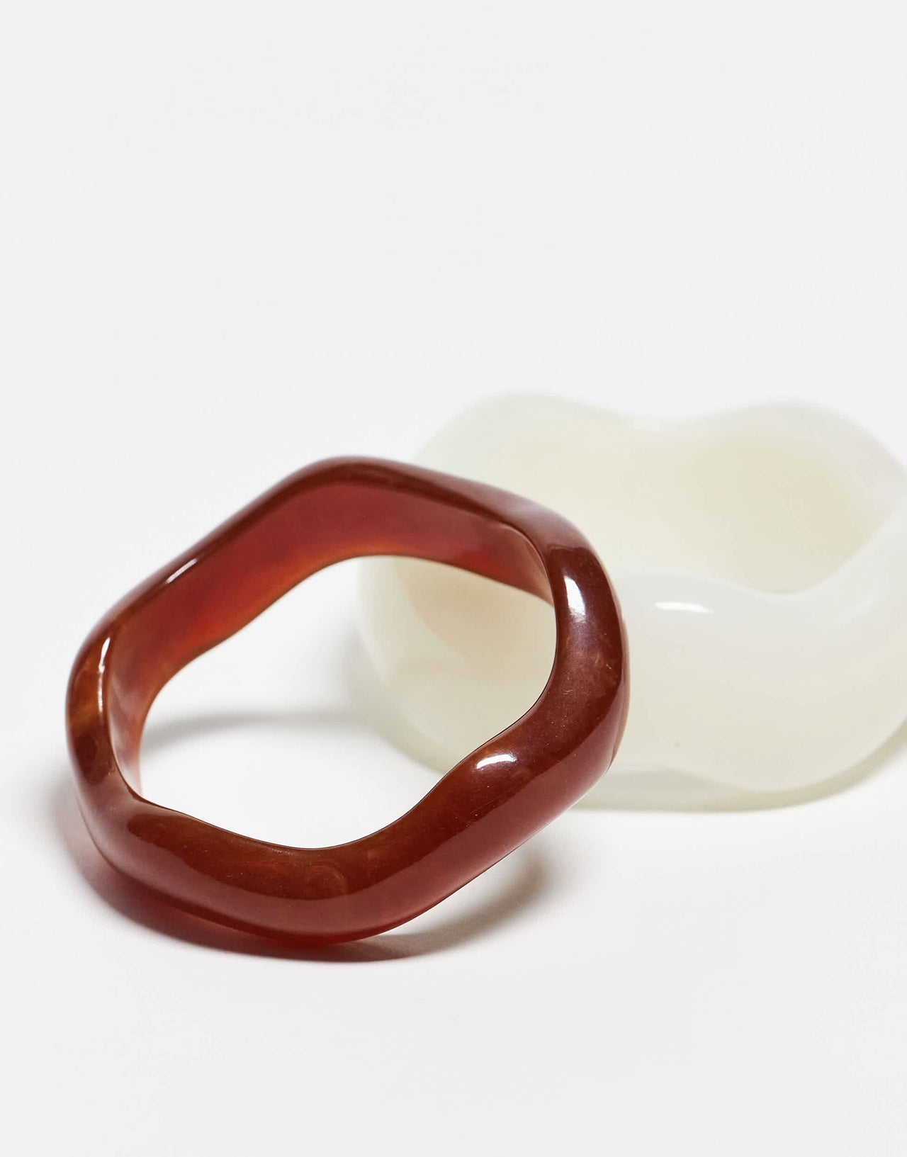 ASOS DESIGN pack of 2 resin bangles in wavy design