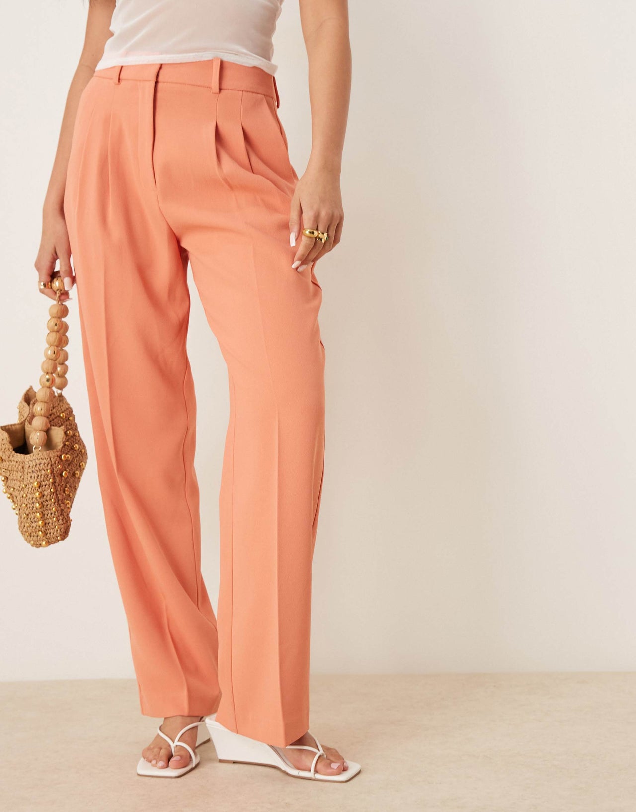 ASOS DESIGN tailored straight leg trousers with pleat detail in orange