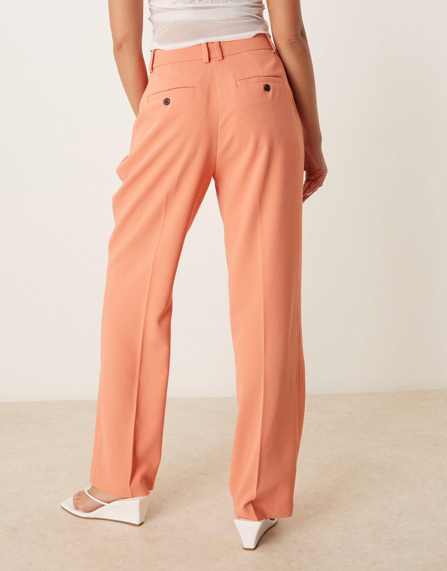 ASOS DESIGN tailored straight leg trousers with pleat detail in orange