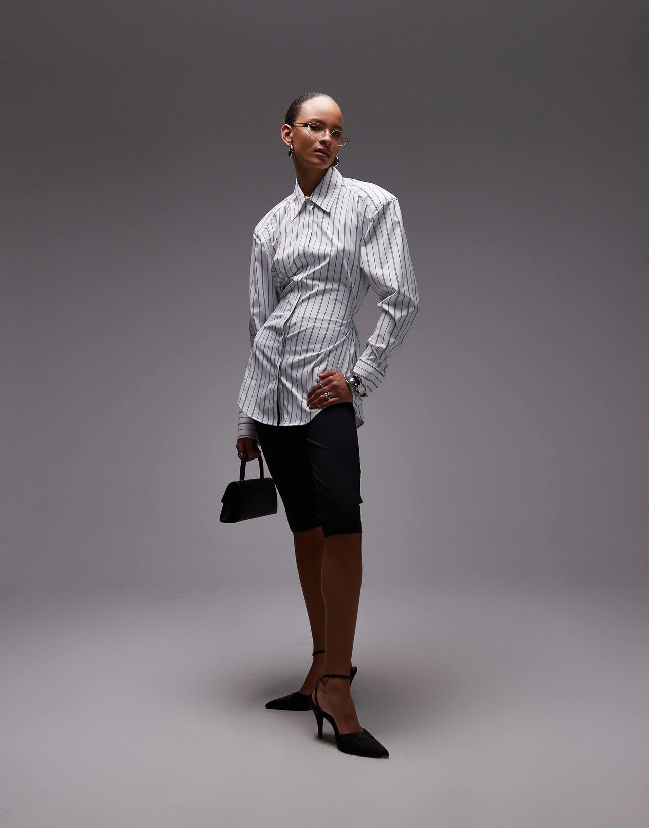 ASOS DESIGN cinch shoulder pad shirt with tie back in black pinstripe