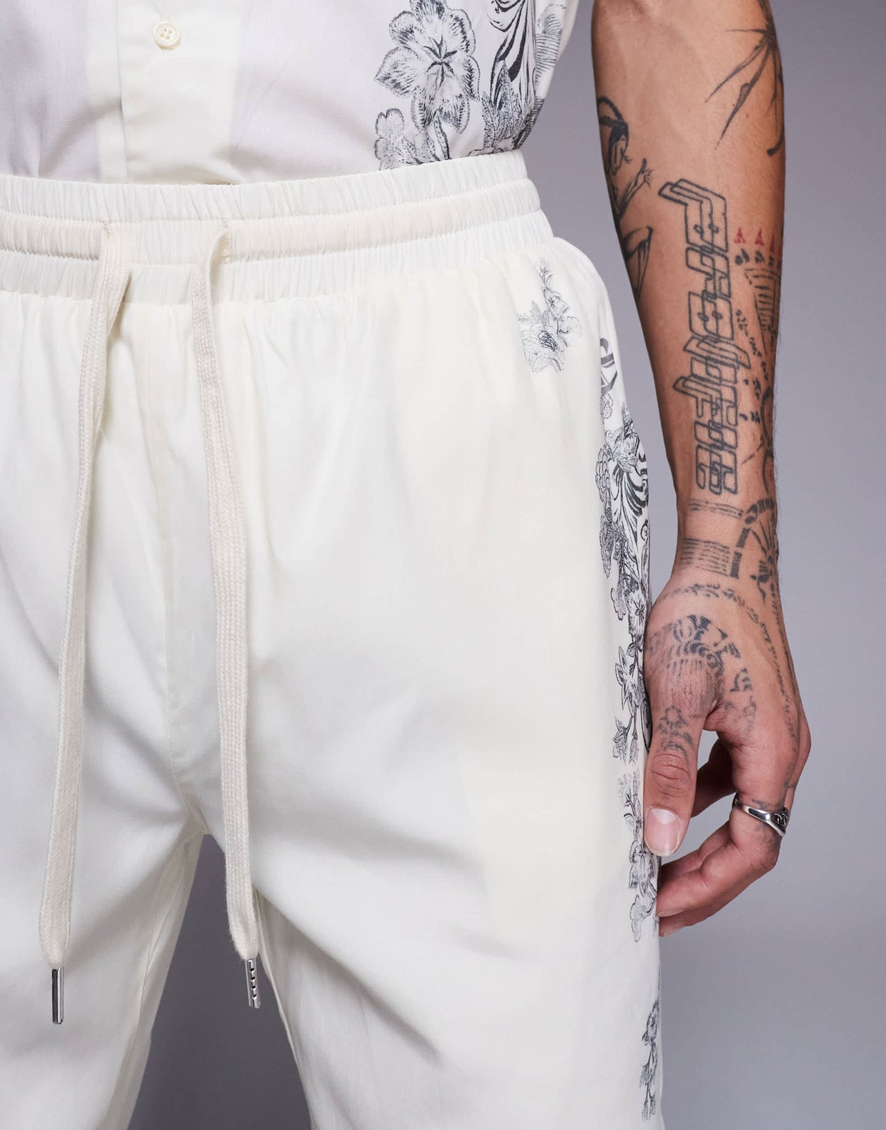 Liquor N Poker royal emblem print motif shorts co-ord in off white